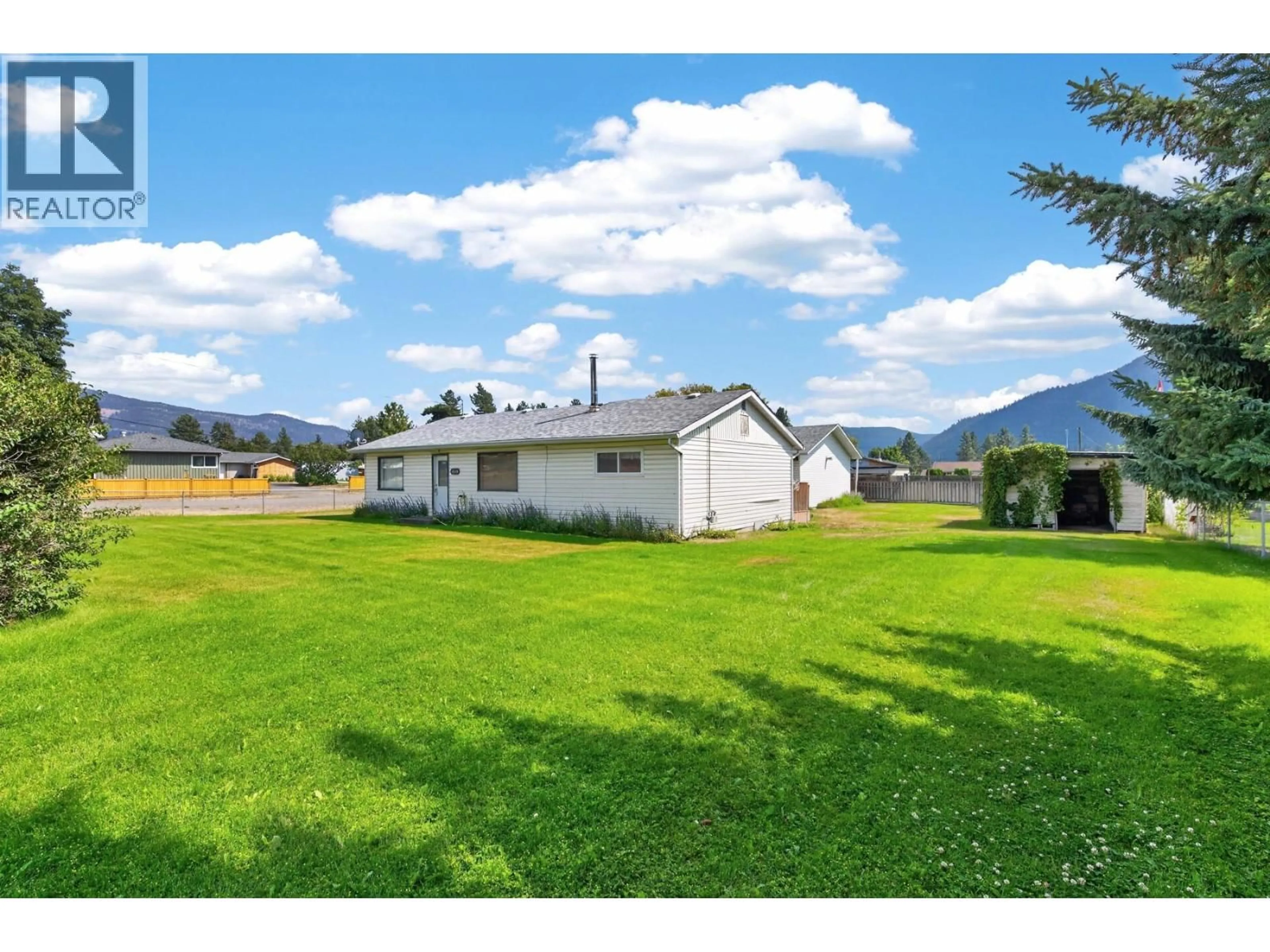 A pic from outside/outdoor area/front of a property/back of a property/a pic from drone, mountain view for 448 WOODWARD AVENUE, Merritt British Columbia V0K1Y0