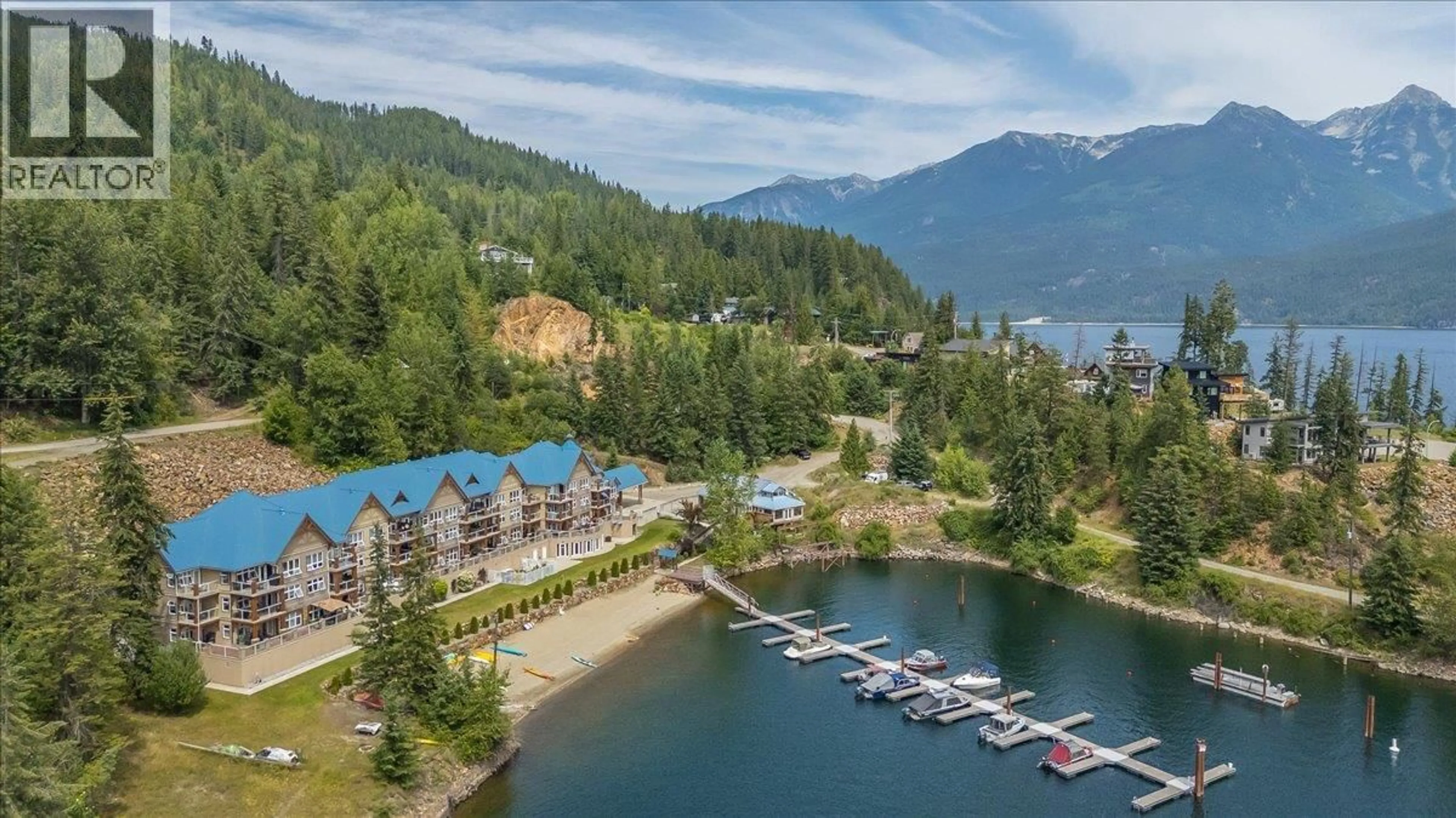 A pic from outside/outdoor area/front of a property/back of a property/a pic from drone, water/lake/river/ocean view for 204 - 550 RAINBOW DRIVE, Kaslo British Columbia V0G1M0