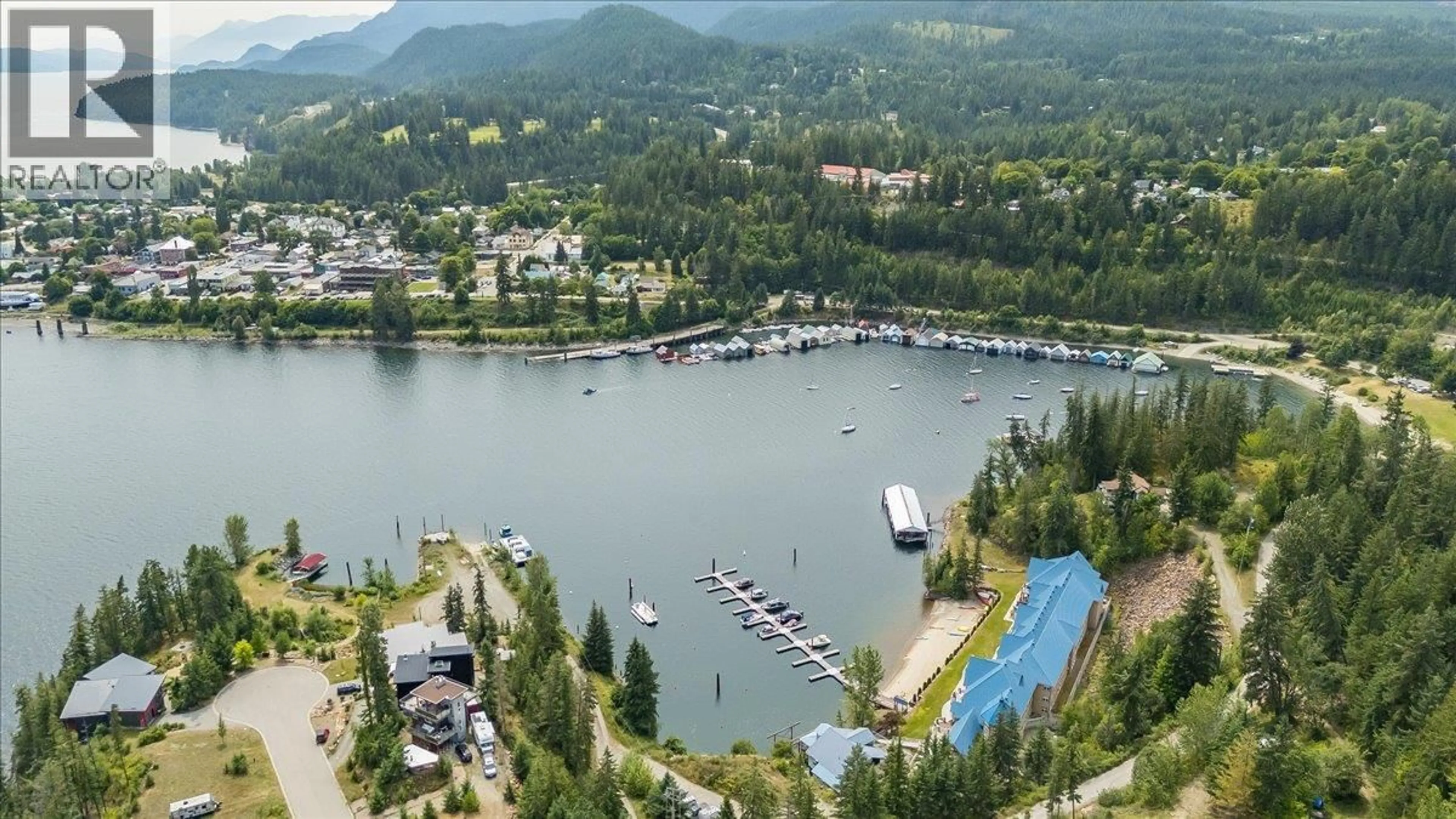 A pic from outside/outdoor area/front of a property/back of a property/a pic from drone, water/lake/river/ocean view for 204 - 550 RAINBOW DRIVE, Kaslo British Columbia V0G1M0