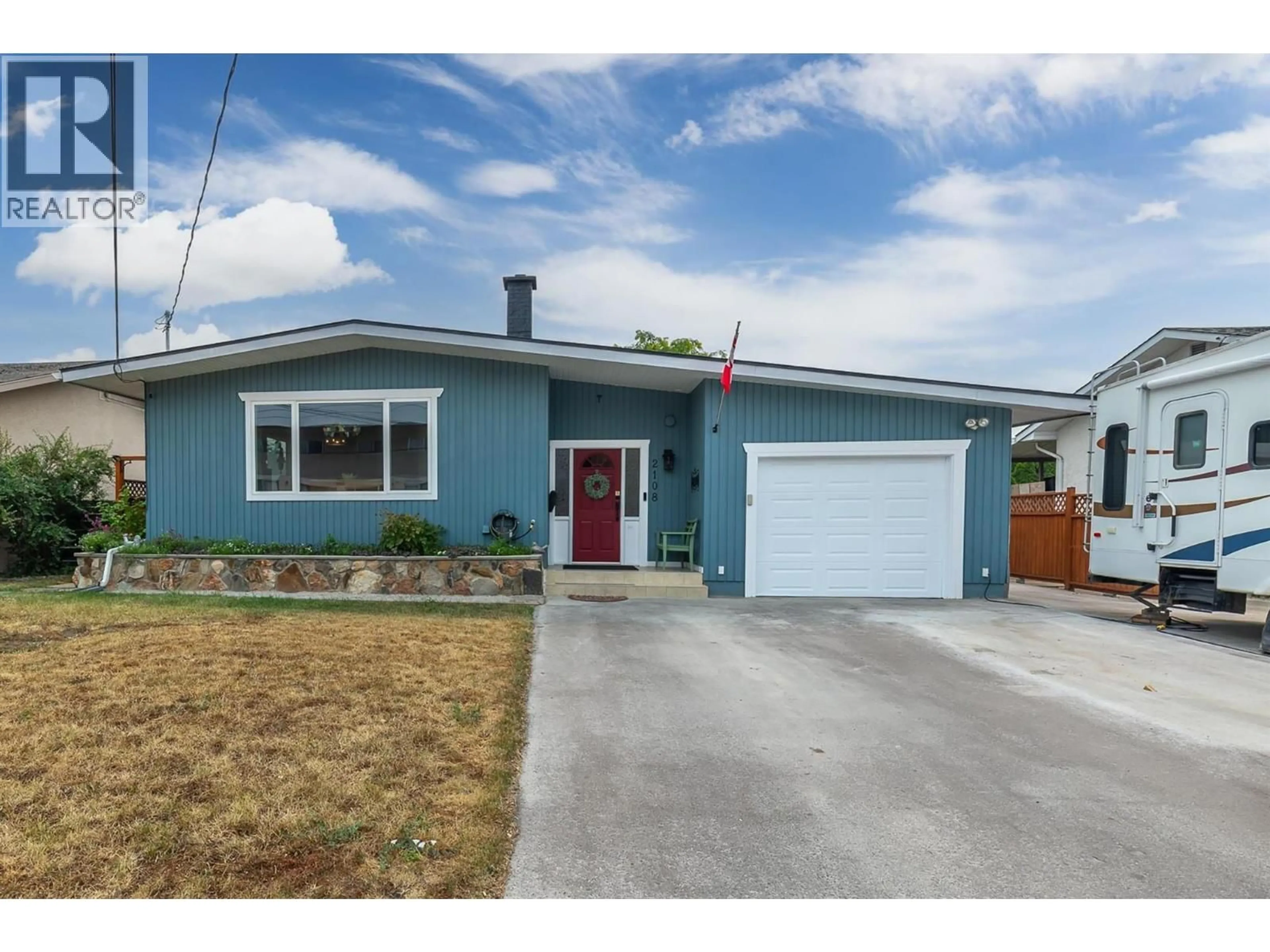 Home with vinyl exterior material, street for 2108 41 AVENUE, Vernon British Columbia V1T3G8