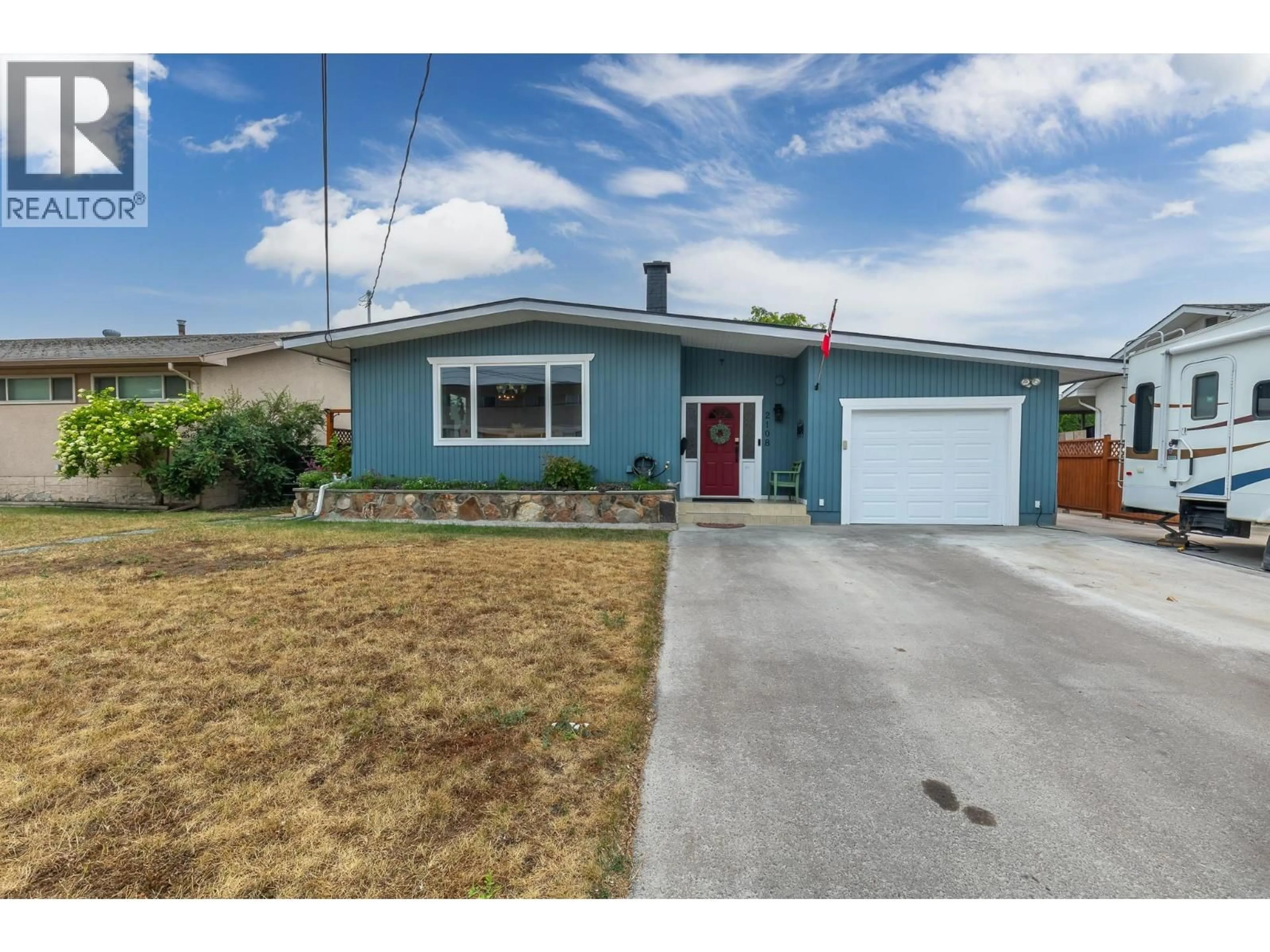 Home with vinyl exterior material, street for 2108 41 AVENUE, Vernon British Columbia V1T3G8