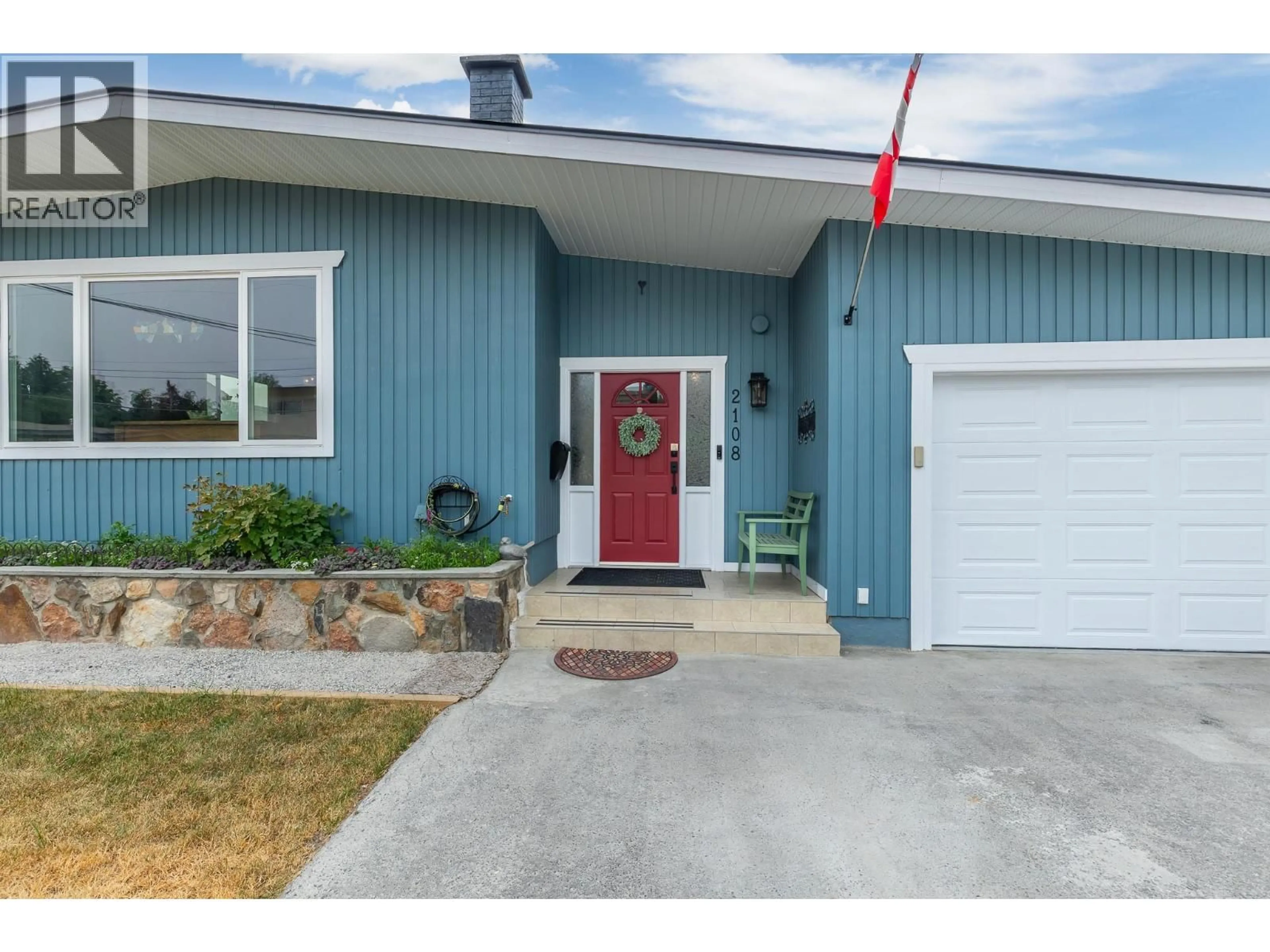 Home with vinyl exterior material, street for 2108 41 AVENUE, Vernon British Columbia V1T3G8