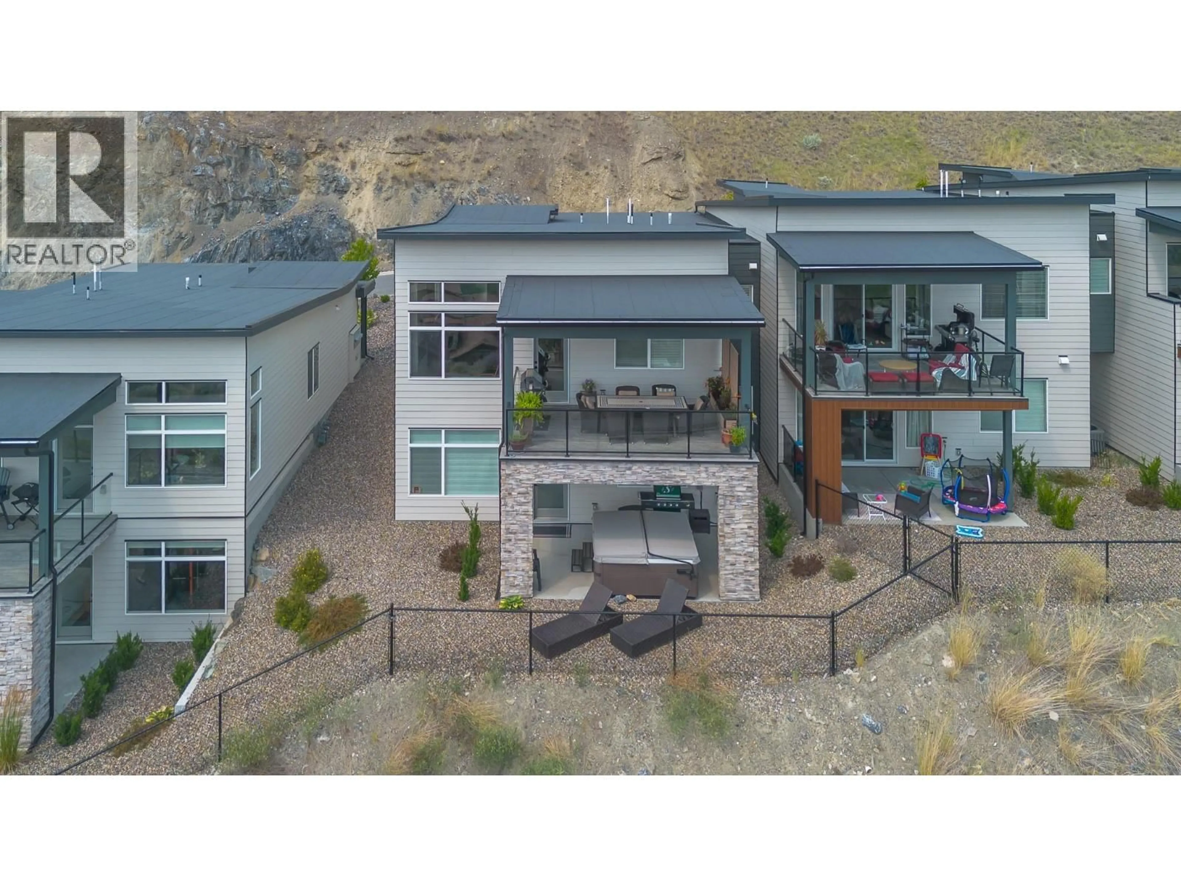 A pic from outside/outdoor area/front of a property/back of a property/a pic from drone, mountain view for 15 - 7735 OKANAGAN HILLS BOULEVARD, Vernon British Columbia V1H0A7
