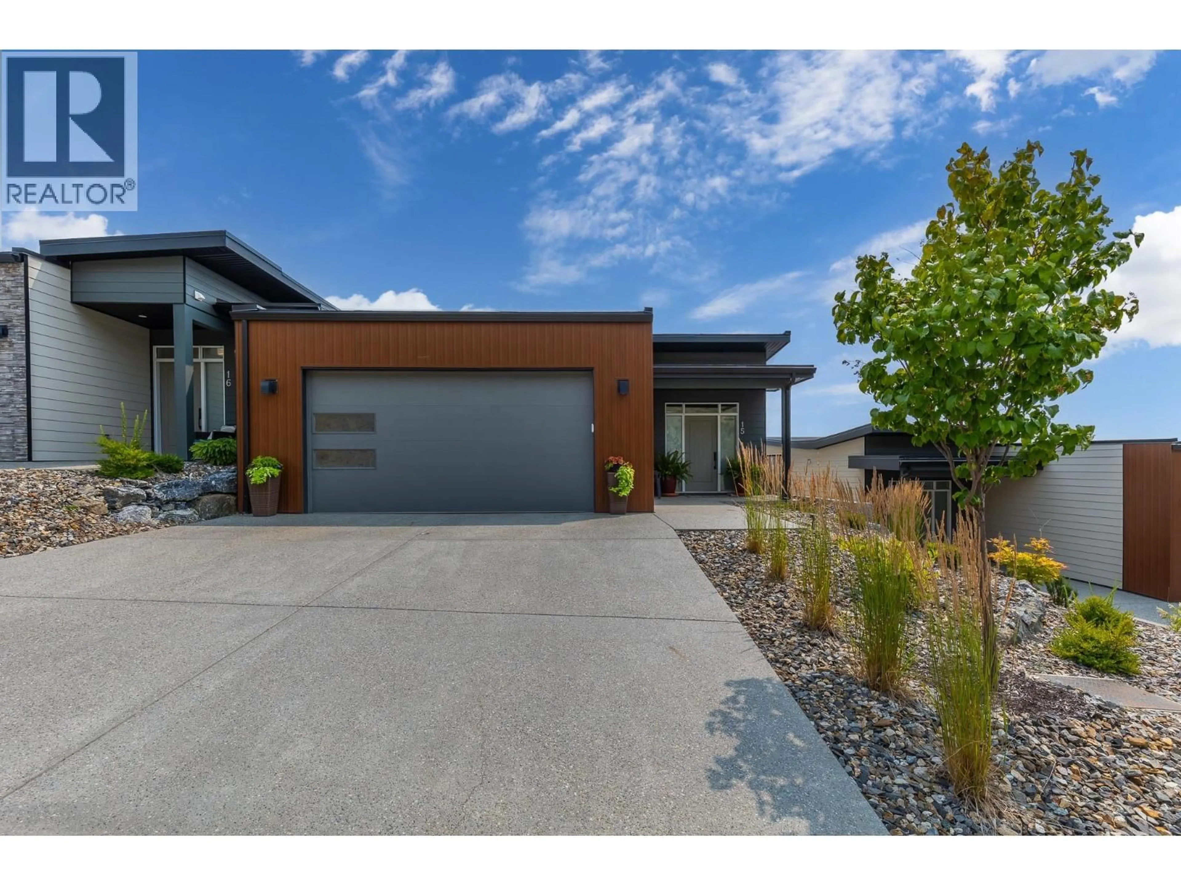 Home with brick exterior material, street for 15 - 7735 OKANAGAN HILLS BOULEVARD, Vernon British Columbia V1H0A7