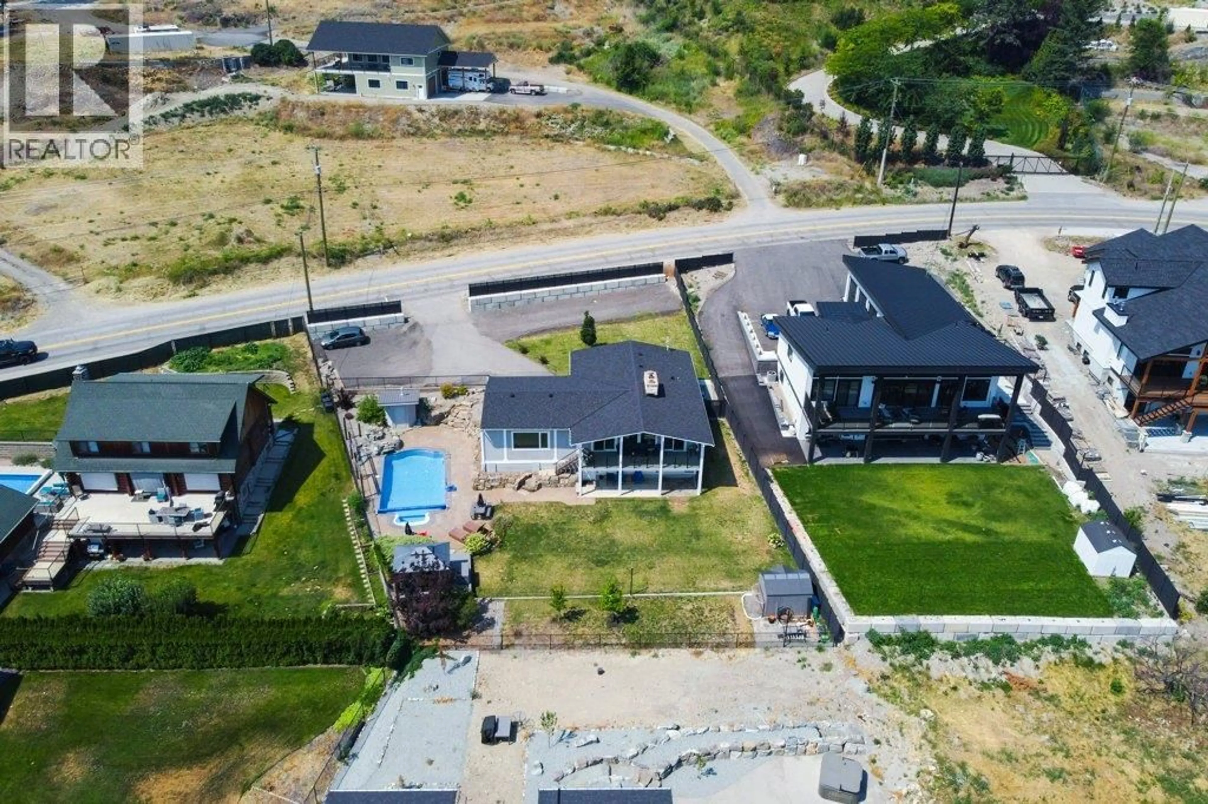 A pic from outside/outdoor area/front of a property/back of a property/a pic from drone, unknown for 111 WESTSIDE ROAD NORTH, Kelowna British Columbia V1Z3S4