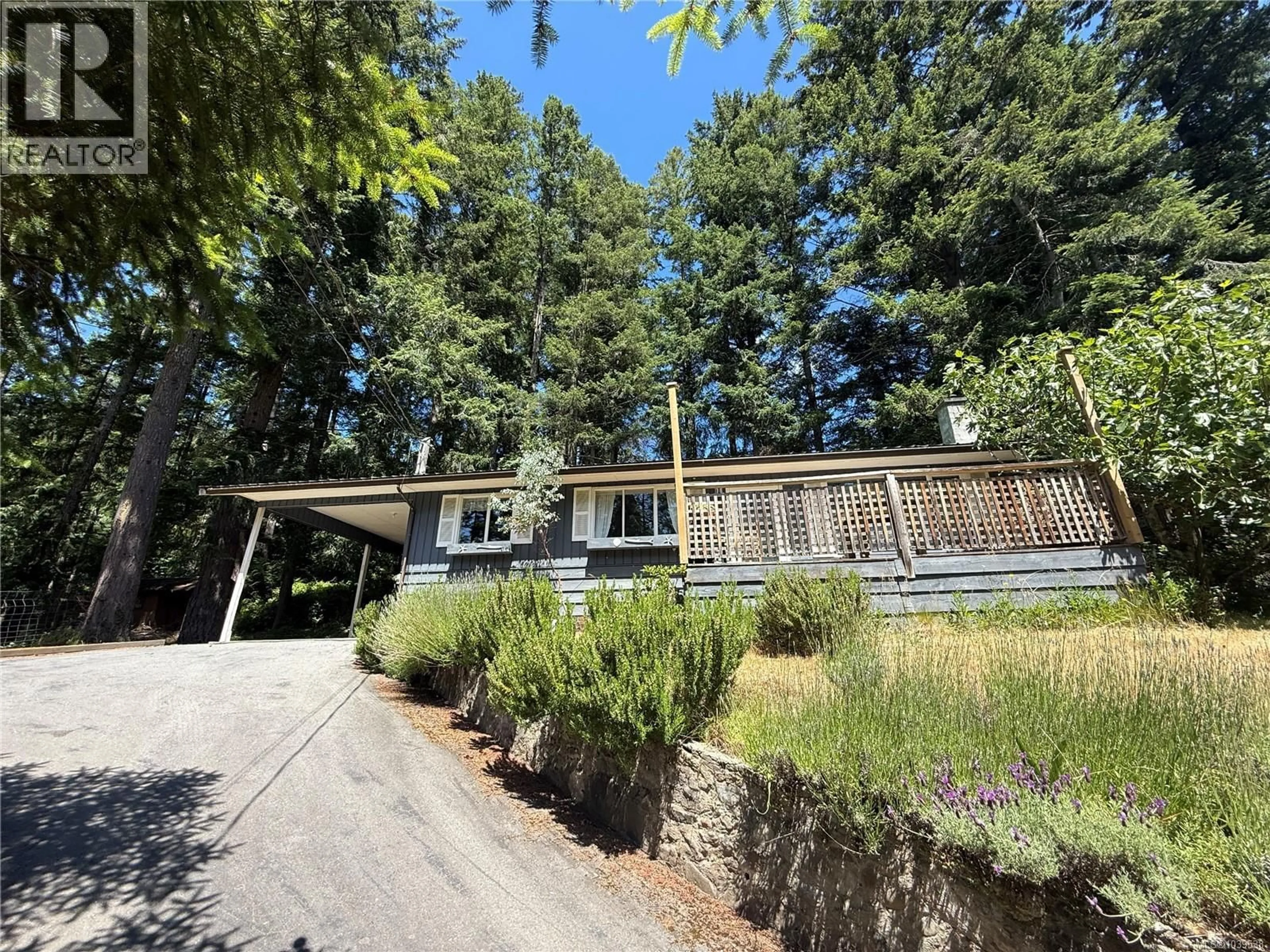 A pic from outside/outdoor area/front of a property/back of a property/a pic from drone, forest/trees view for 201 HARRISON AVENUE NORTHWEST, Salt Spring British Columbia V8K2N3
