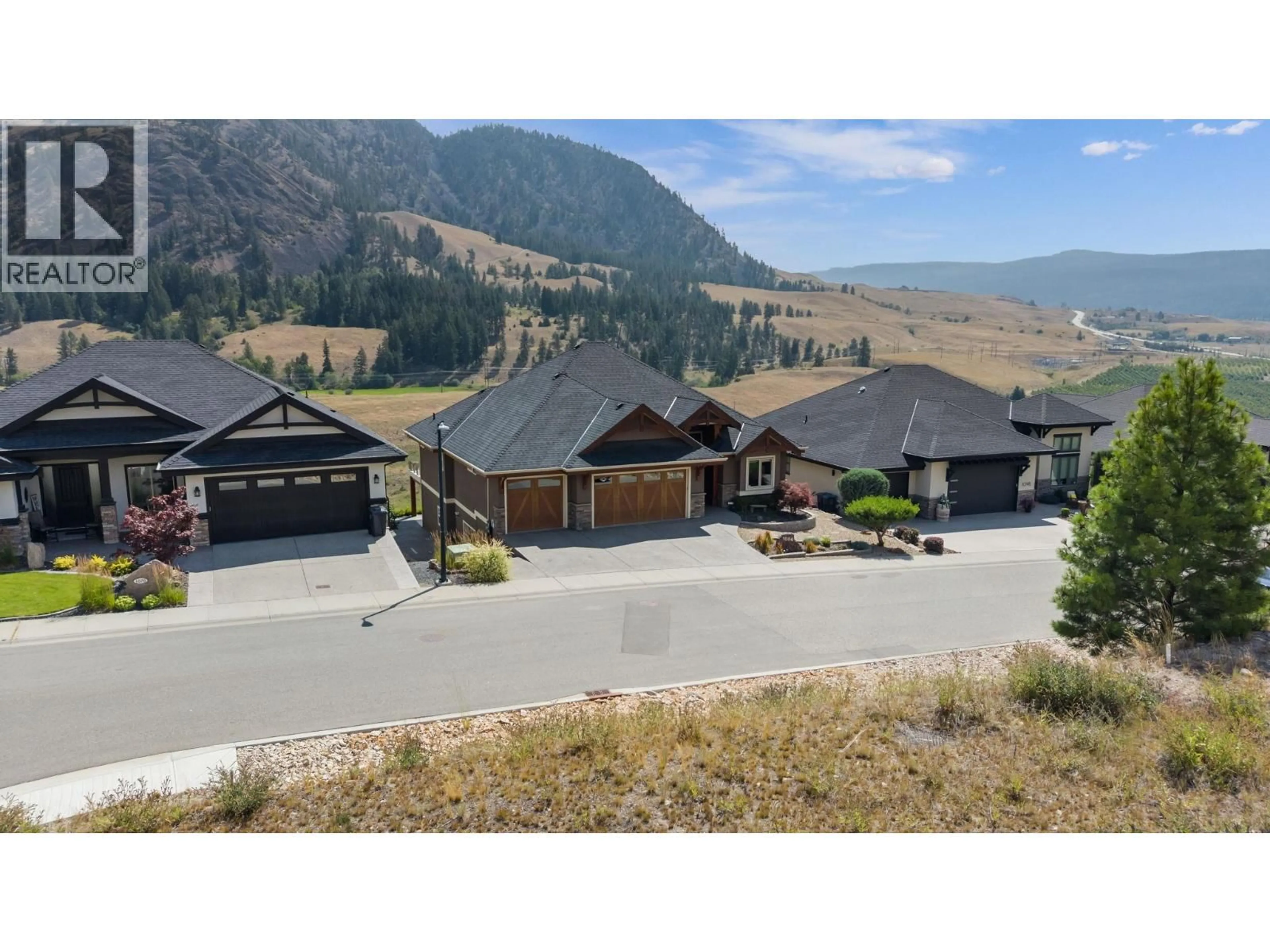 A pic from outside/outdoor area/front of a property/back of a property/a pic from drone, mountain view for 1084 STOCKLEY STREET, Kelowna British Columbia V1P1R6