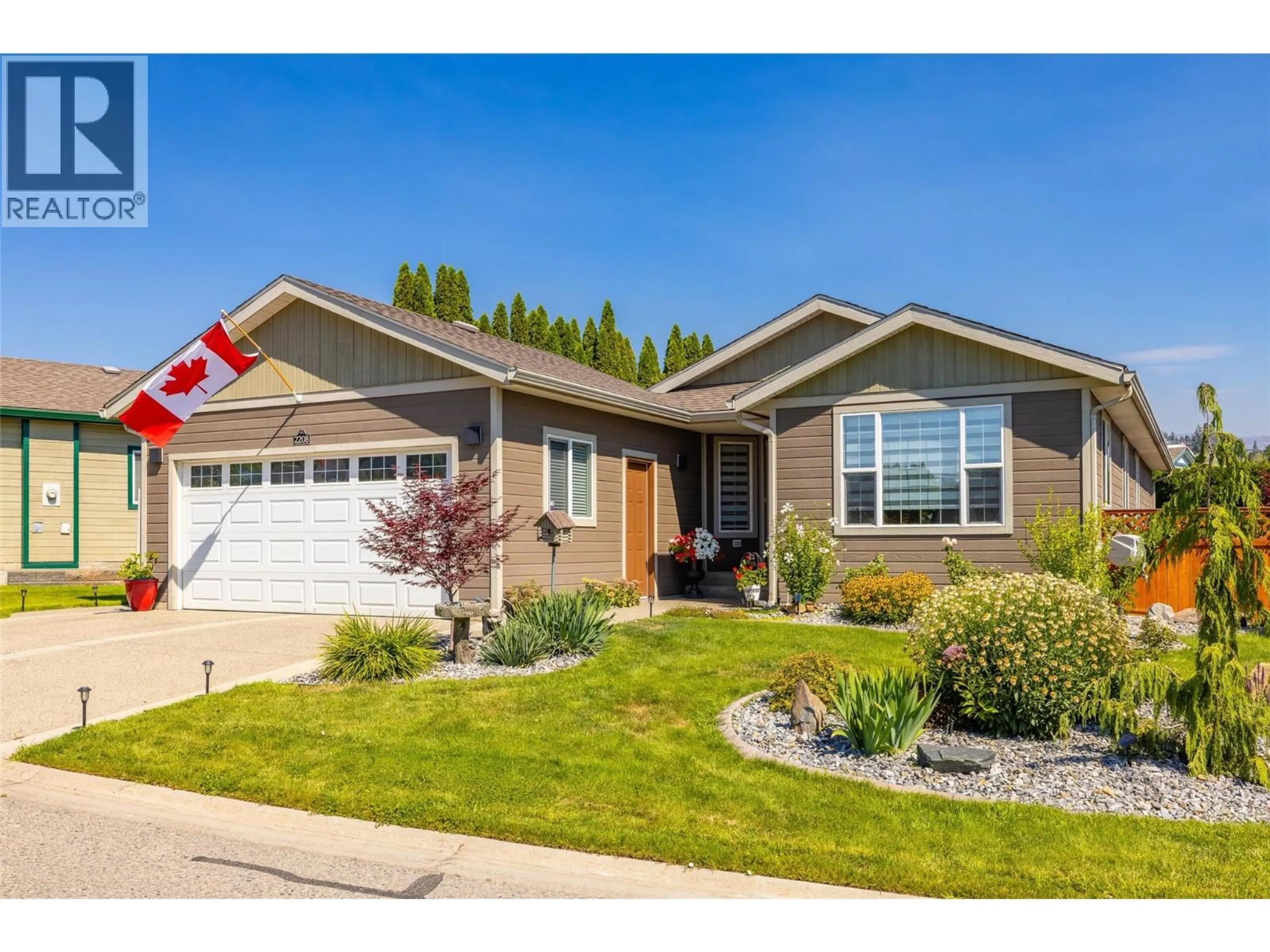 Home with vinyl exterior material, street for 2208 MIMOSA DRIVE, West Kelowna British Columbia V4T3A5