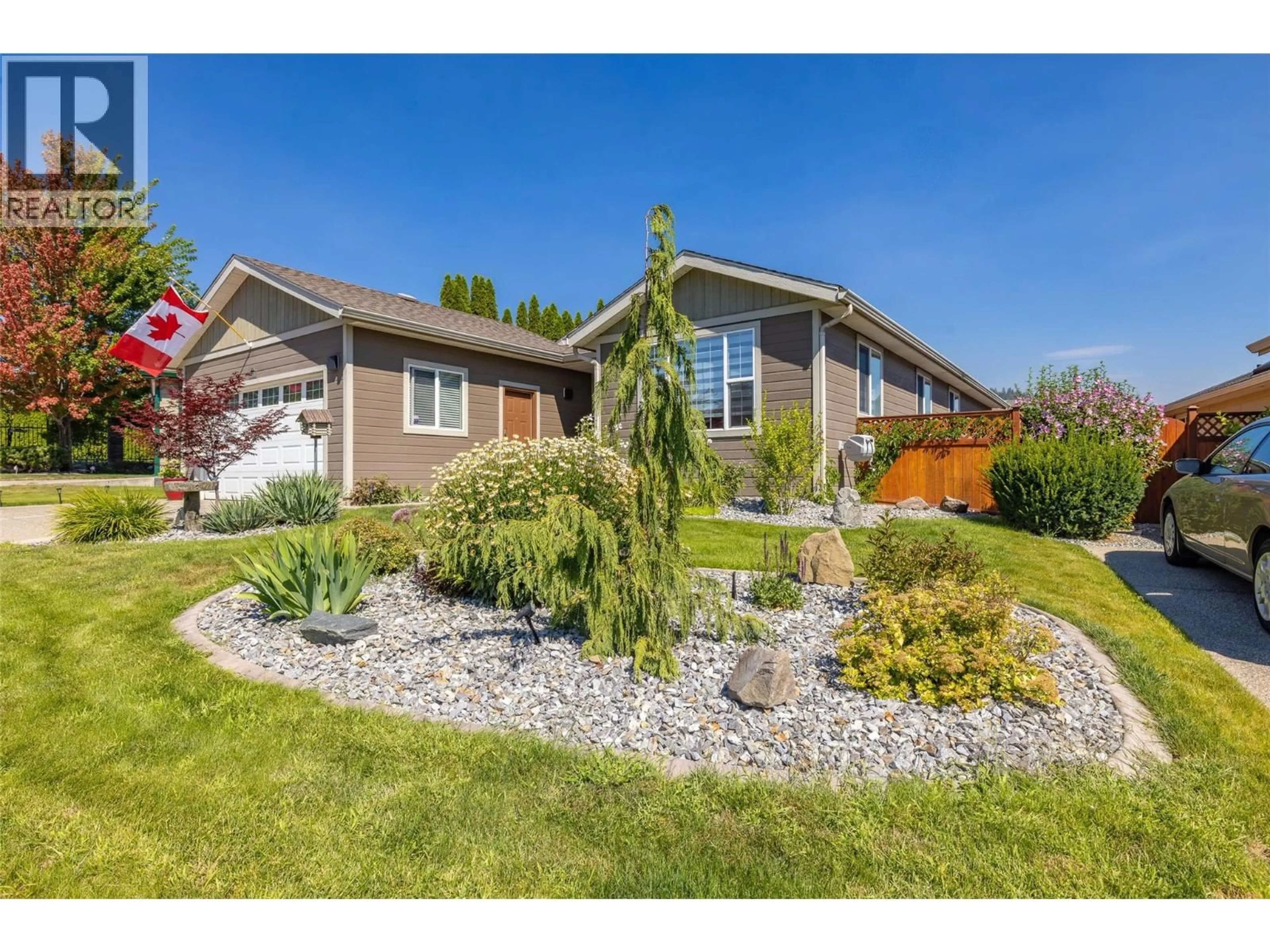 Home with vinyl exterior material, street for 2208 MIMOSA DRIVE, West Kelowna British Columbia V4T3A5