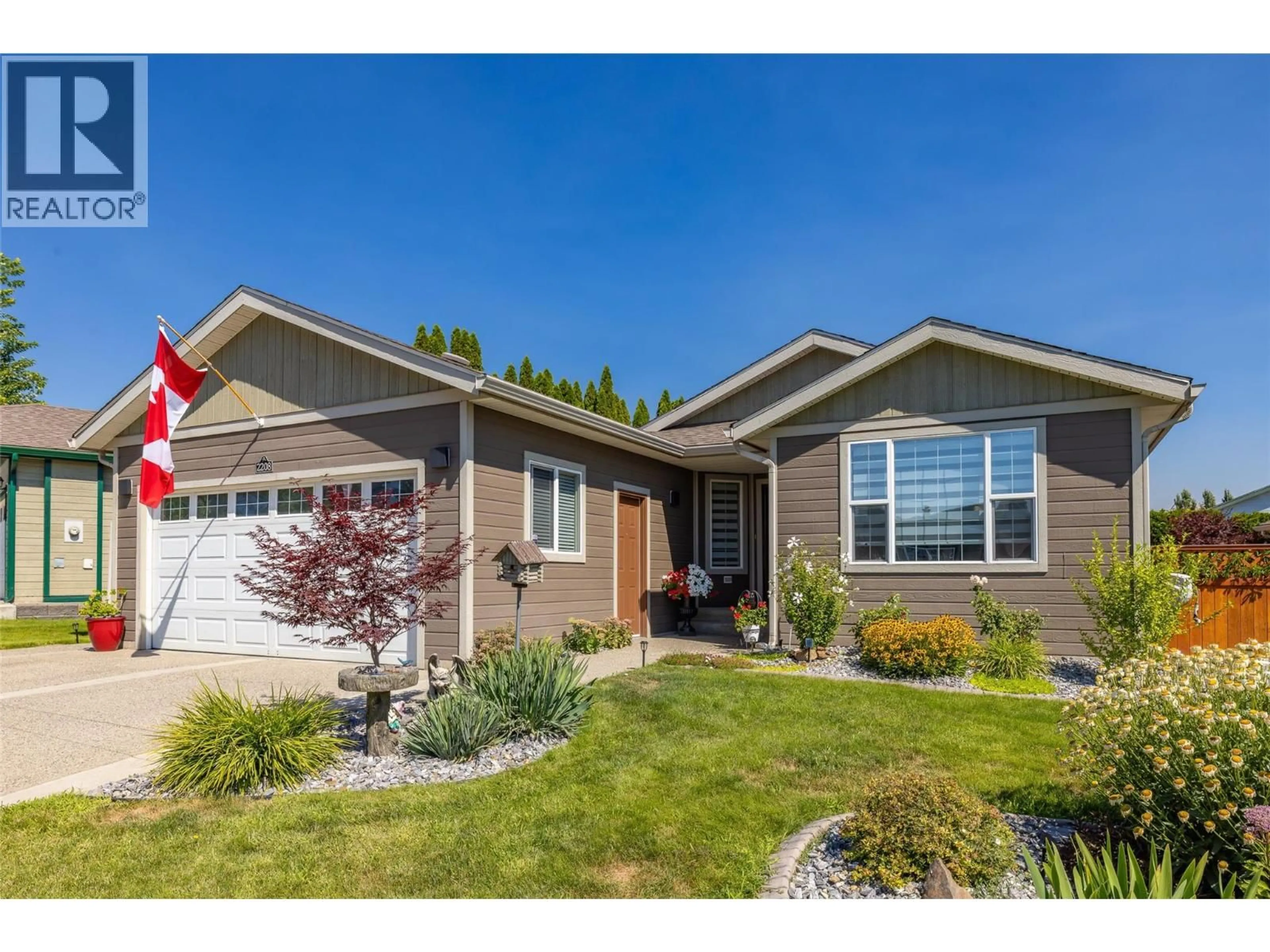 Home with vinyl exterior material, street for 2208 MIMOSA DRIVE, West Kelowna British Columbia V4T3A5