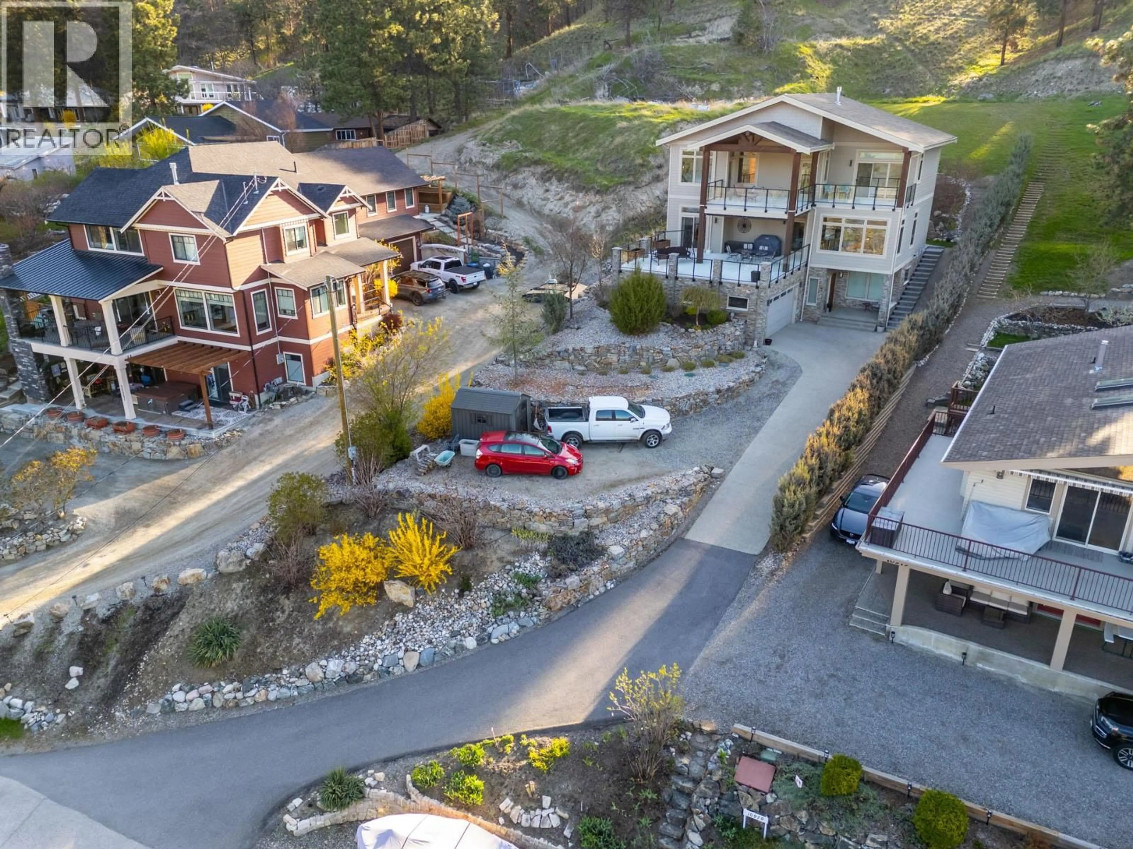 A pic from outside/outdoor area/front of a property/back of a property/a pic from drone, street for 10989 MADDOCK AVENUE, Lake Country British Columbia V4V2J6