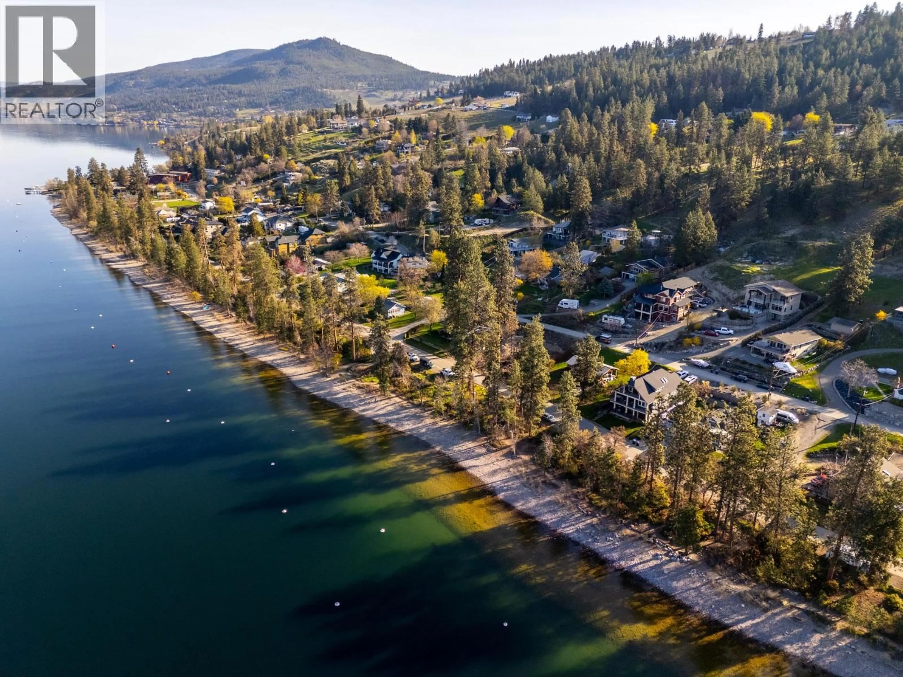 A pic from outside/outdoor area/front of a property/back of a property/a pic from drone, water/lake/river/ocean view for 10989 MADDOCK AVENUE, Lake Country British Columbia V4V2J6
