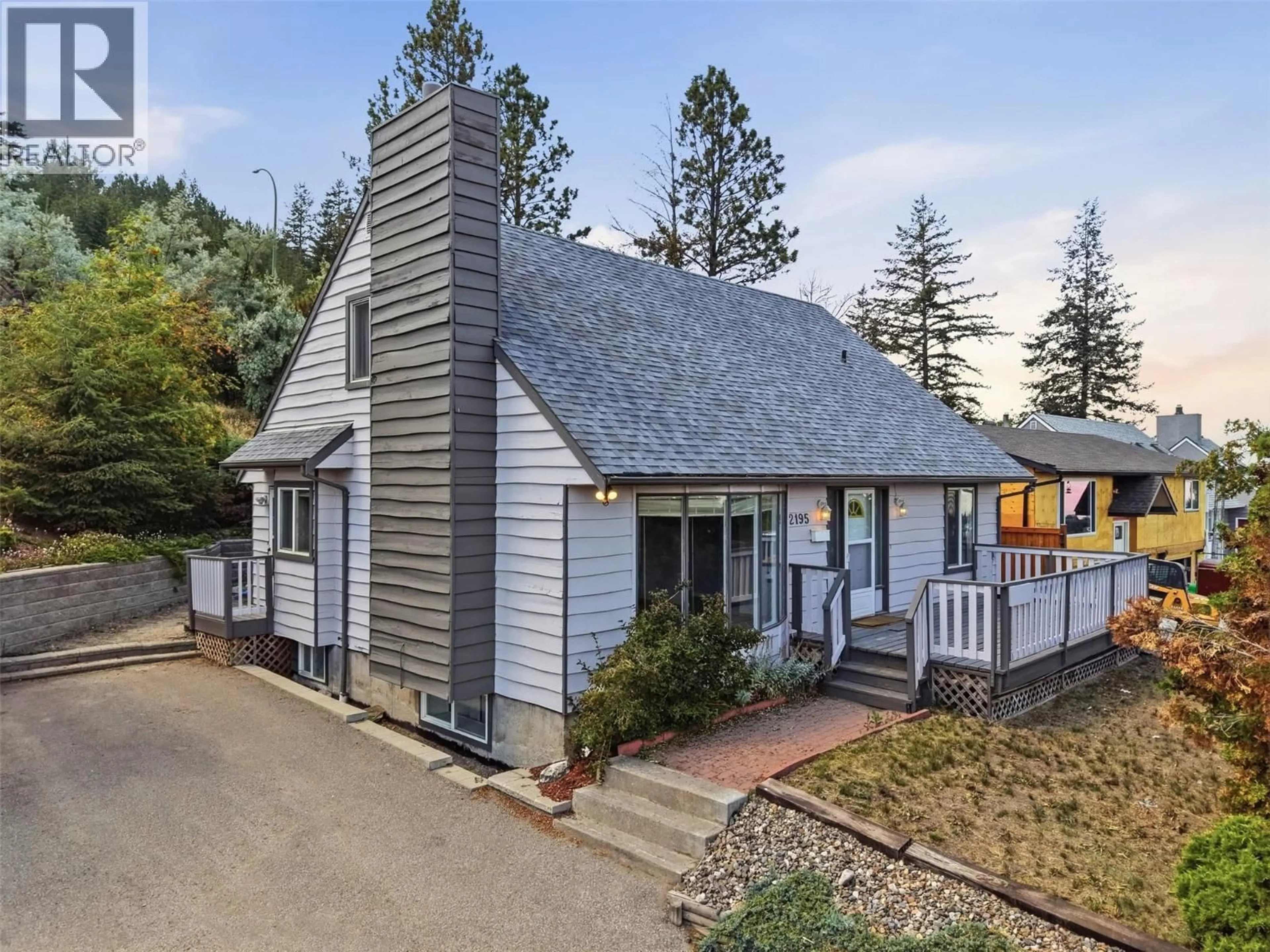 A pic from outside/outdoor area/front of a property/back of a property/a pic from drone, street for 2195 SIFTON LANE, Kamloops British Columbia V1S1A4