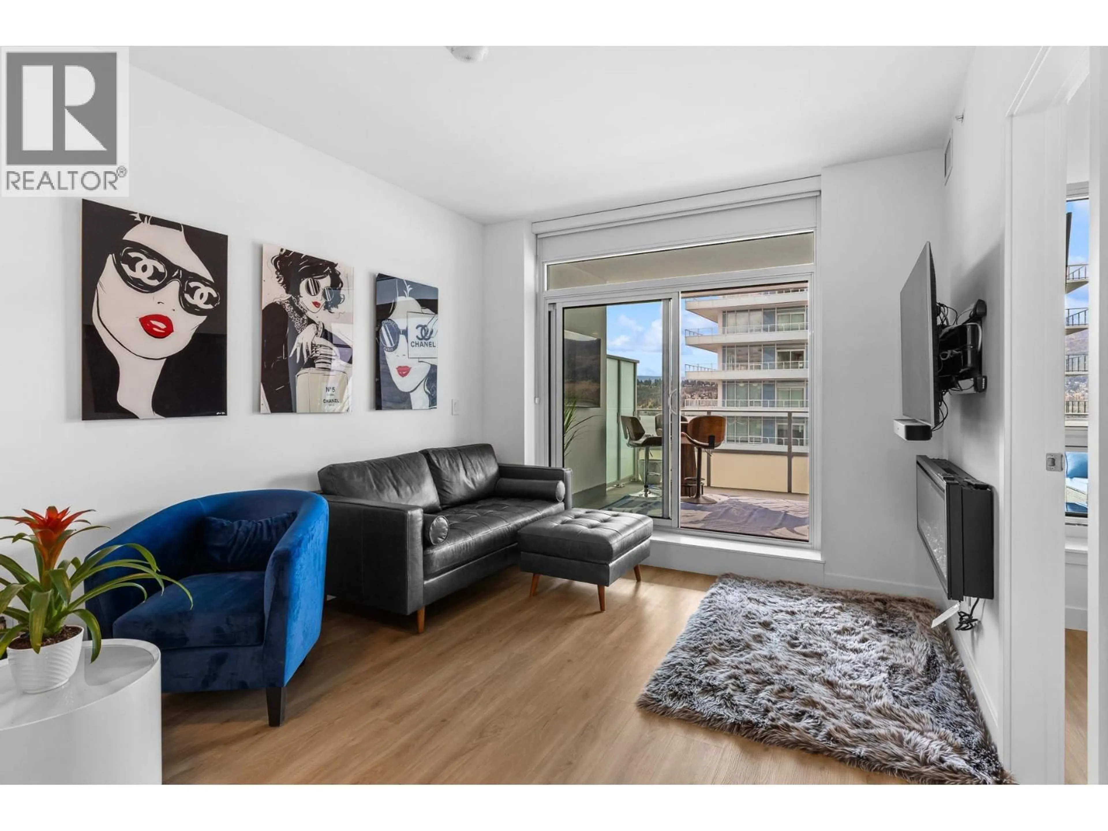 Living room with furniture, wood/laminate floor for 1808 - 1626 WATER STREET, Kelowna British Columbia V1Y0N7