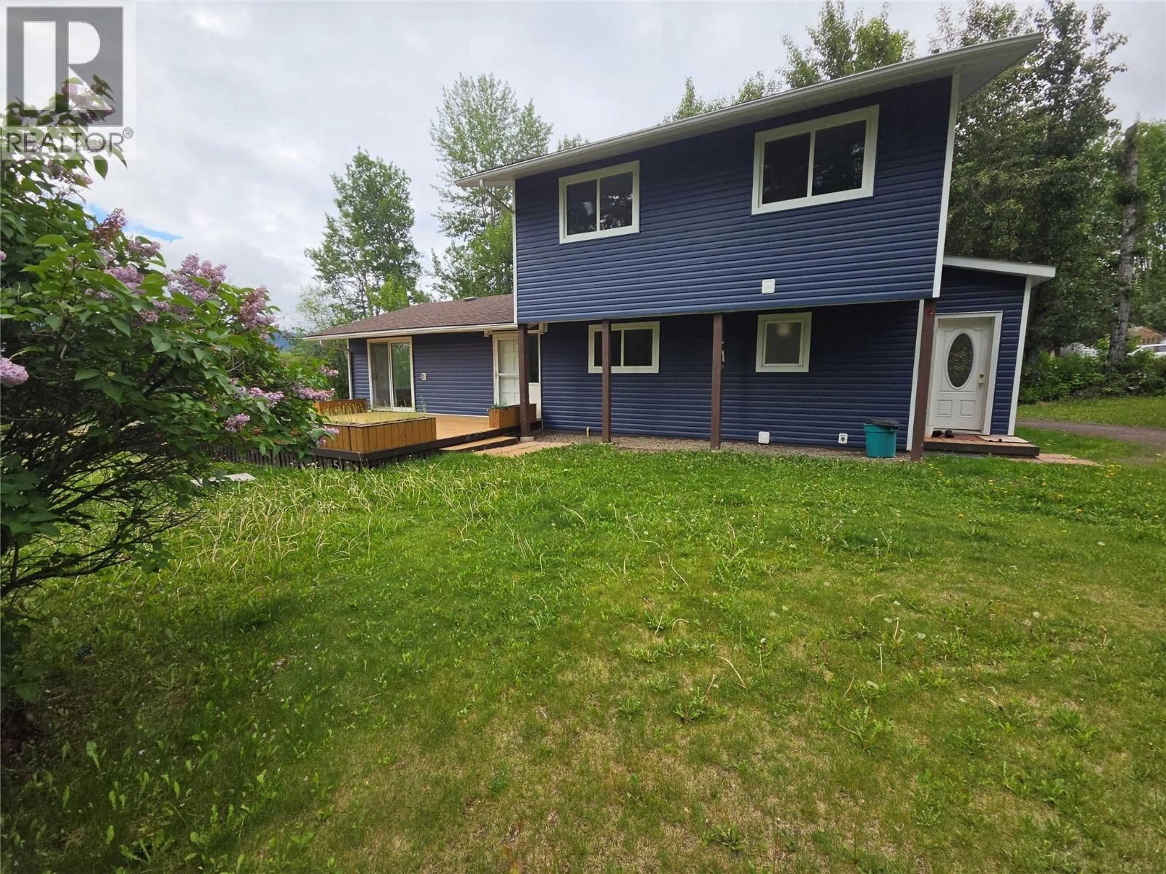 A pic from outside/outdoor area/front of a property/back of a property/a pic from drone, water/lake/river/ocean view for 6640 LAKESHORE DRIVE, Moberly Lake British Columbia V0C1X0