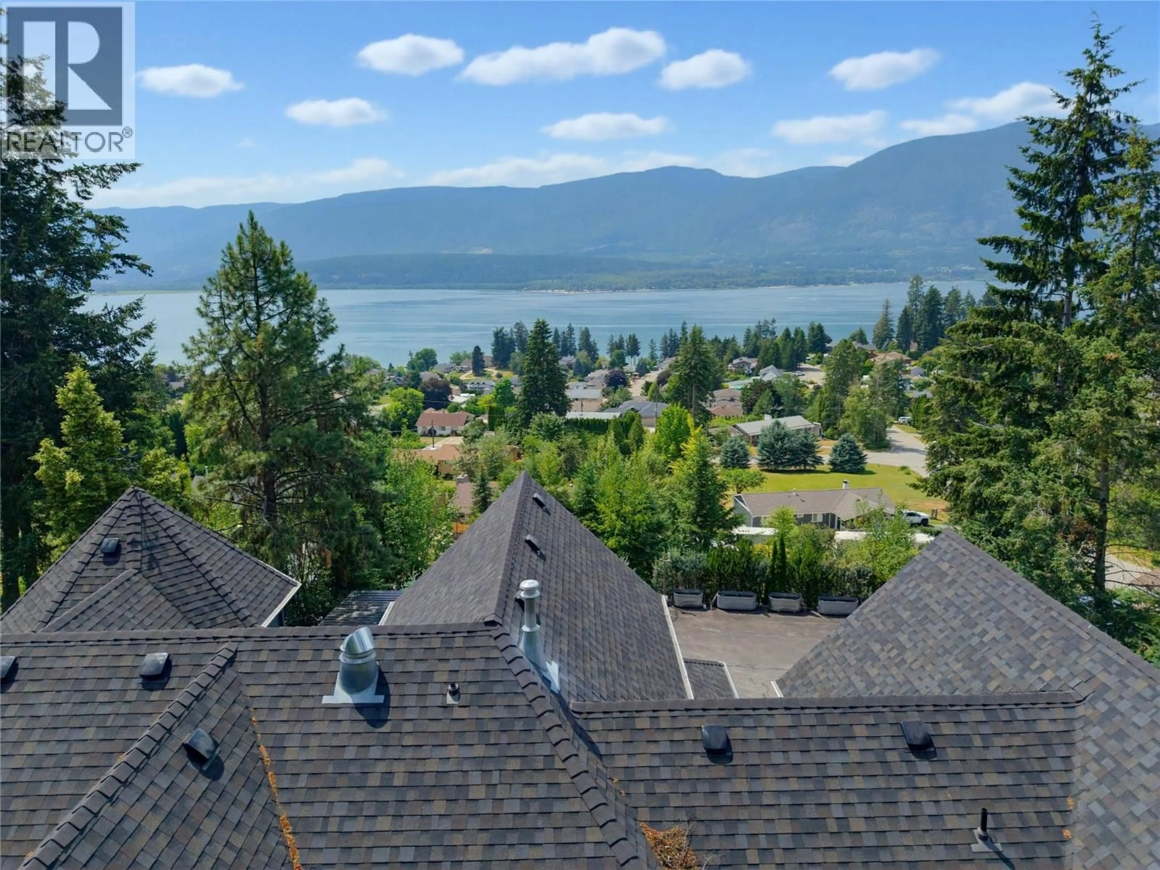 A pic from outside/outdoor area/front of a property/back of a property/a pic from drone, water/lake/river/ocean view for 4940 16 STREET NORTHEAST, Salmon Arm British Columbia V1E1E1