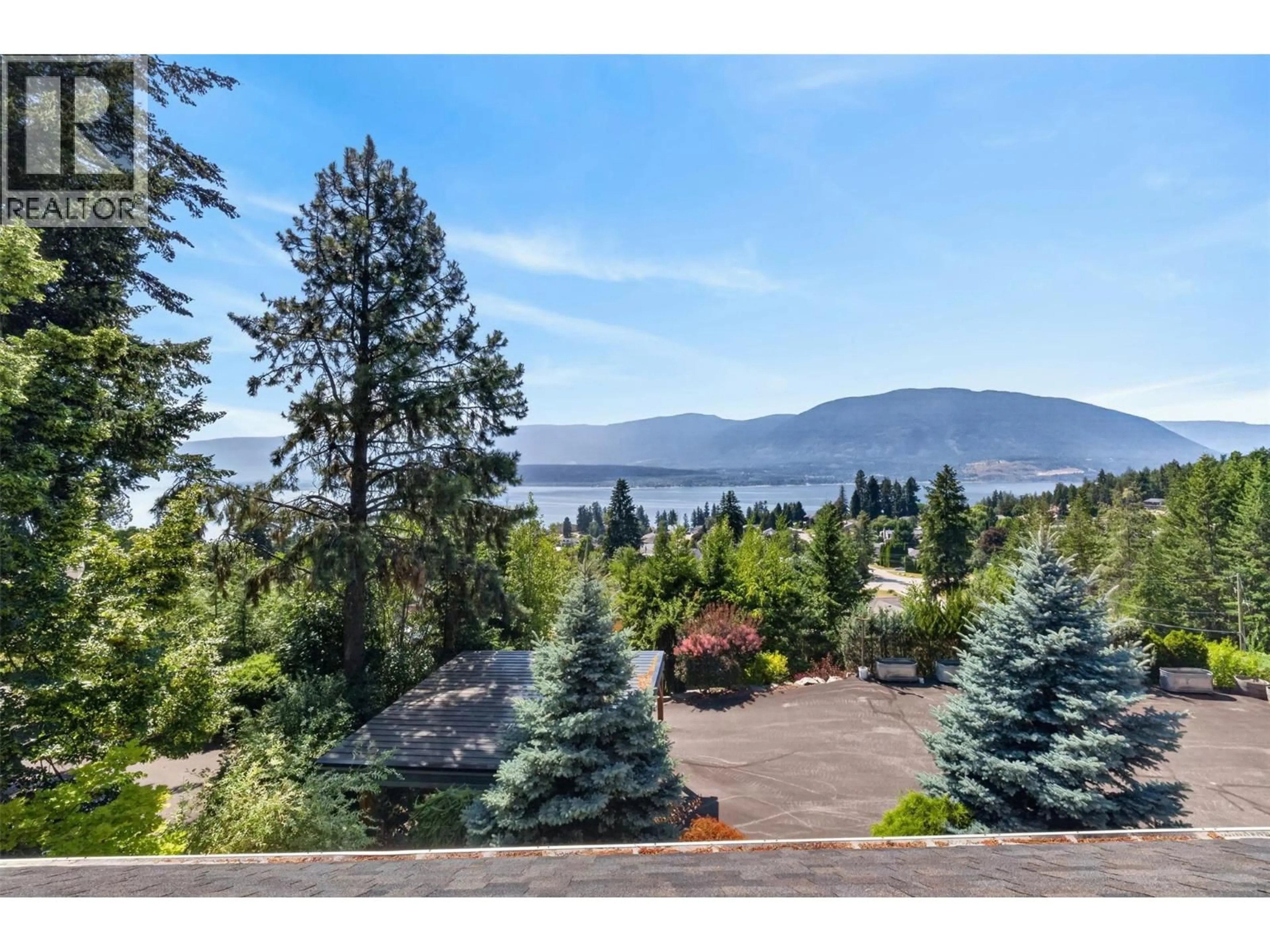 A pic from outside/outdoor area/front of a property/back of a property/a pic from drone, mountain view for 4940 16 STREET NORTHEAST, Salmon Arm British Columbia V1E1E1