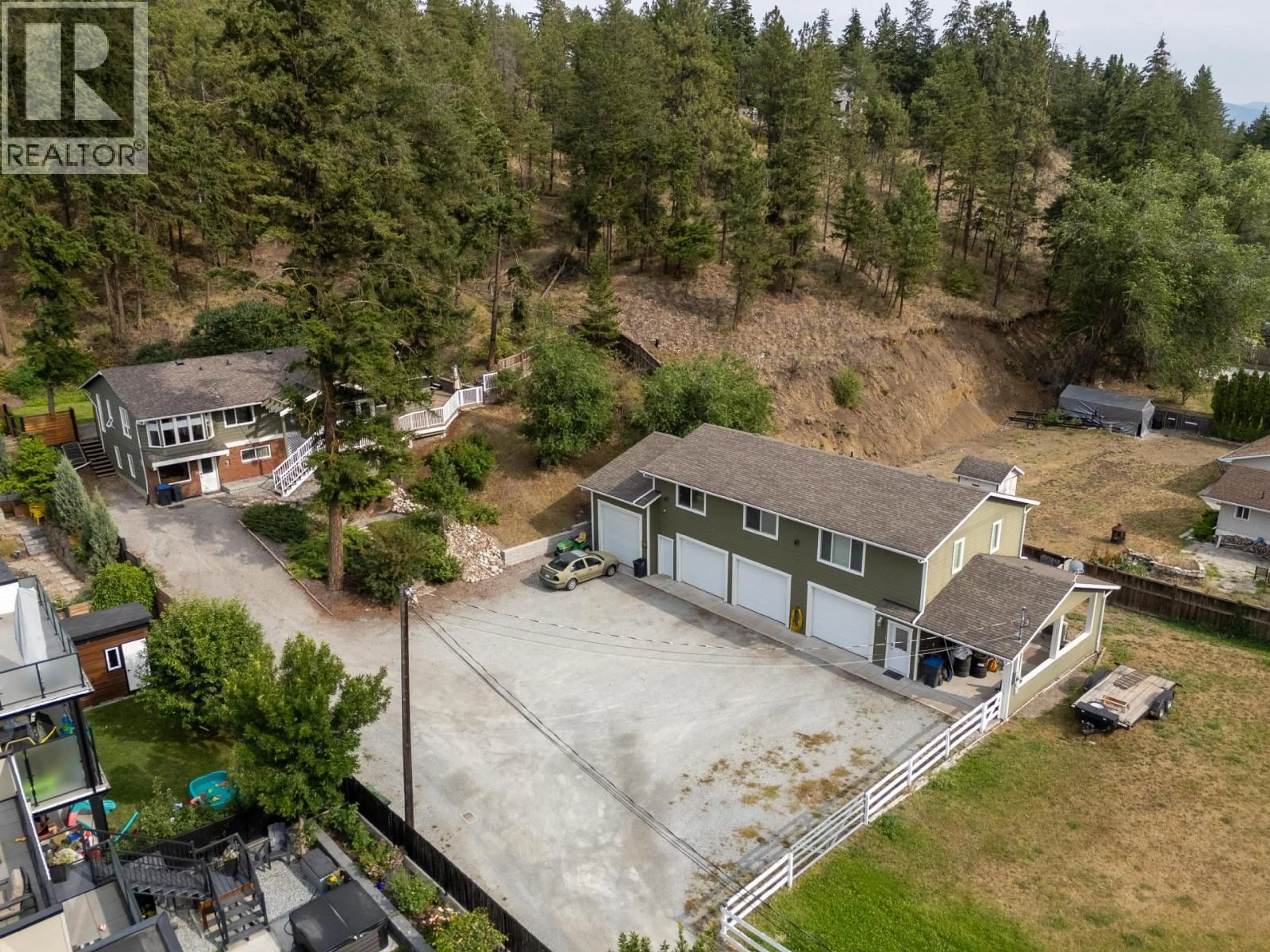 A pic from outside/outdoor area/front of a property/back of a property/a pic from drone, unknown for 353 CLIFTON ROAD SOUTH, Kelowna British Columbia V1V1A4