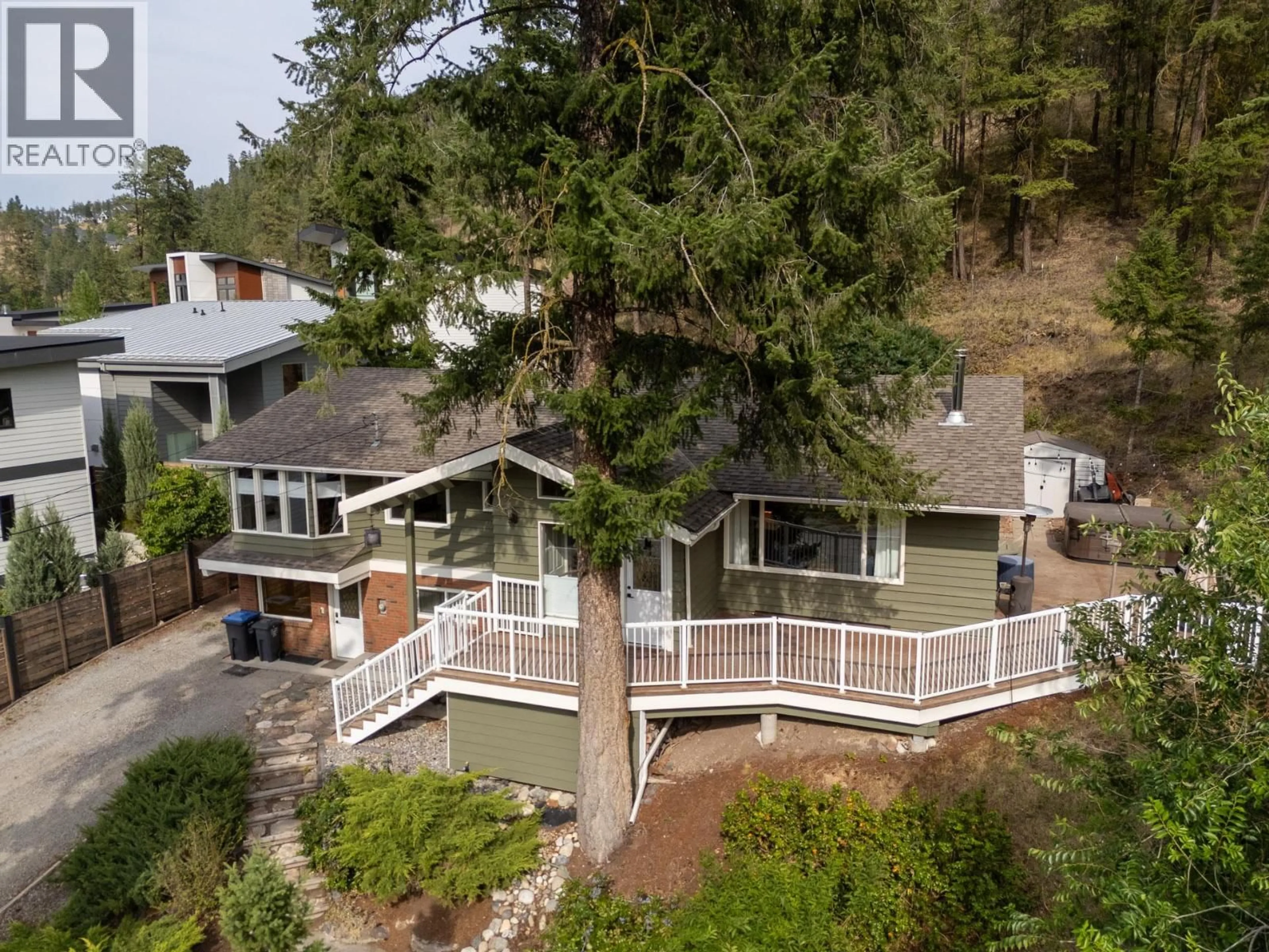 A pic from outside/outdoor area/front of a property/back of a property/a pic from drone, unknown for 353 CLIFTON ROAD SOUTH, Kelowna British Columbia V1V1A4