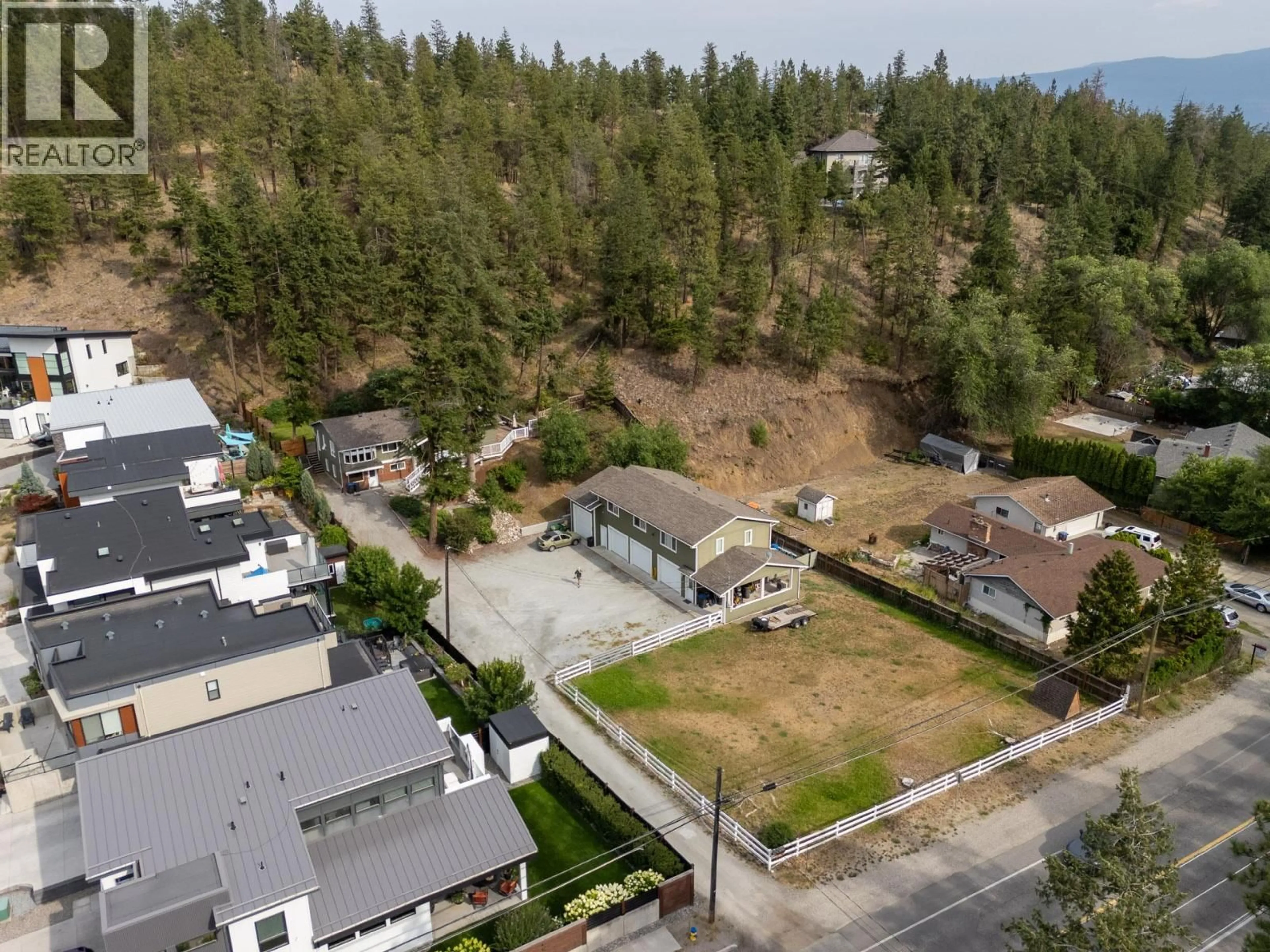 A pic from outside/outdoor area/front of a property/back of a property/a pic from drone, unknown for 353 CLIFTON ROAD SOUTH, Kelowna British Columbia V1V1A4