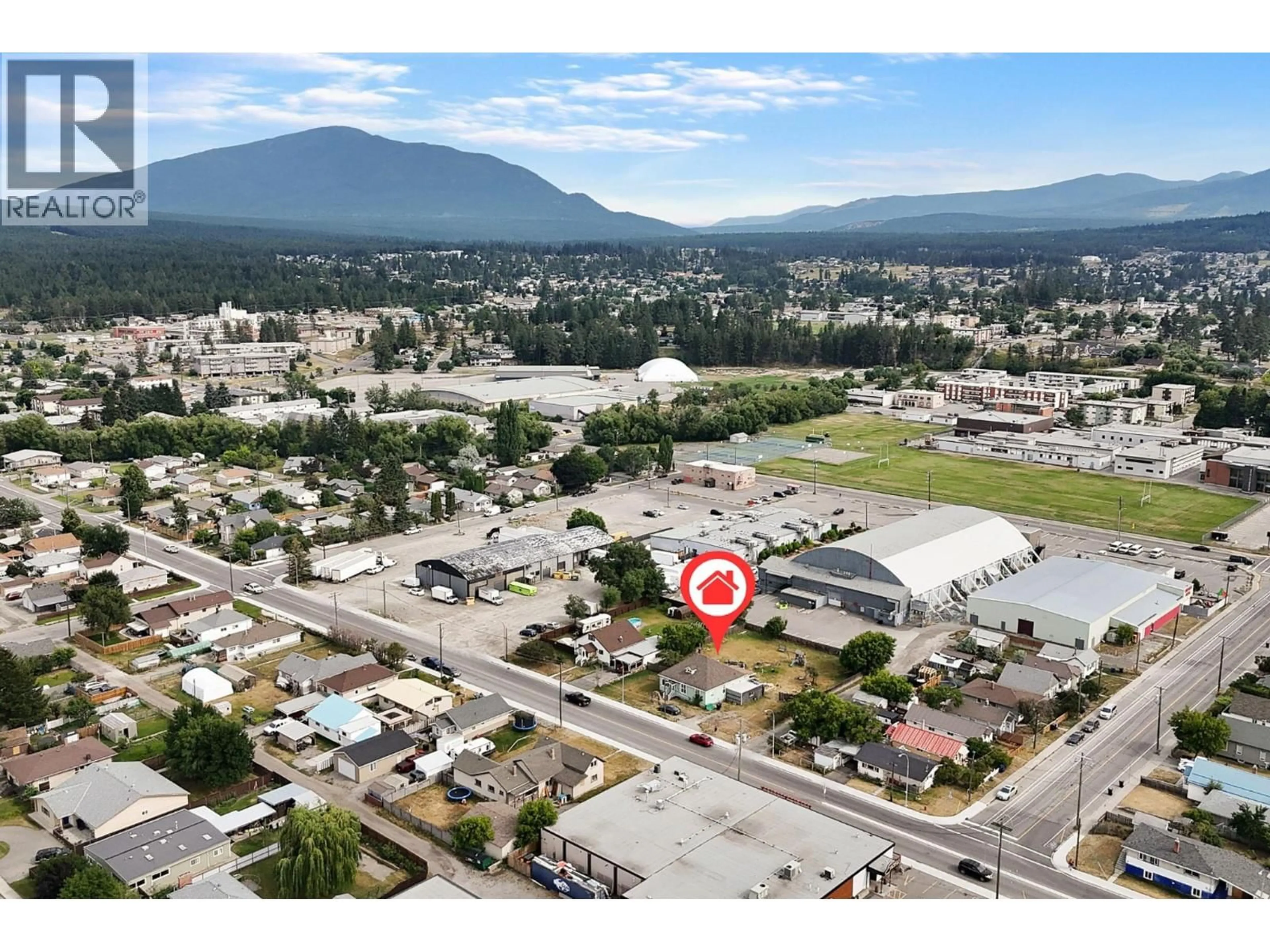A pic from outside/outdoor area/front of a property/back of a property/a pic from drone, mountain view for 1415 4 STREET NORTH, Cranbrook British Columbia V1C3L6