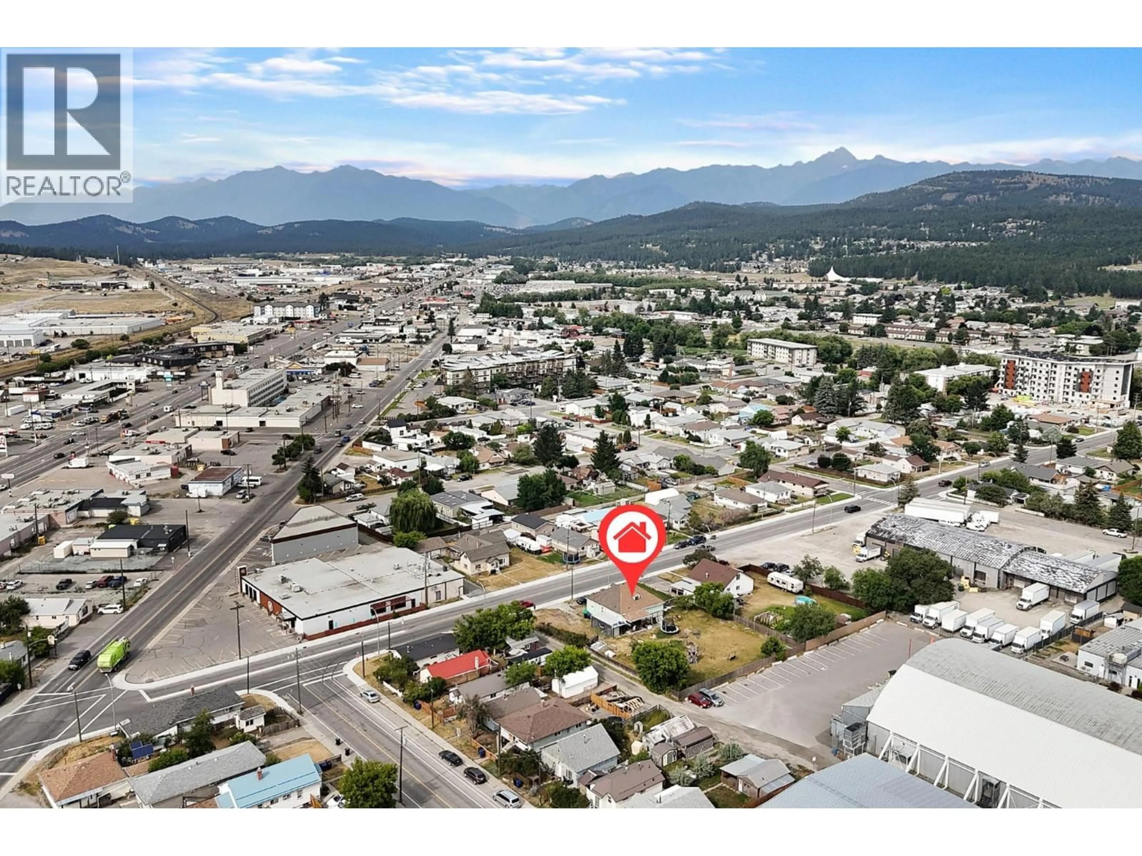 A pic from outside/outdoor area/front of a property/back of a property/a pic from drone, mountain view for 1415 4 STREET NORTH, Cranbrook British Columbia V1C3L6