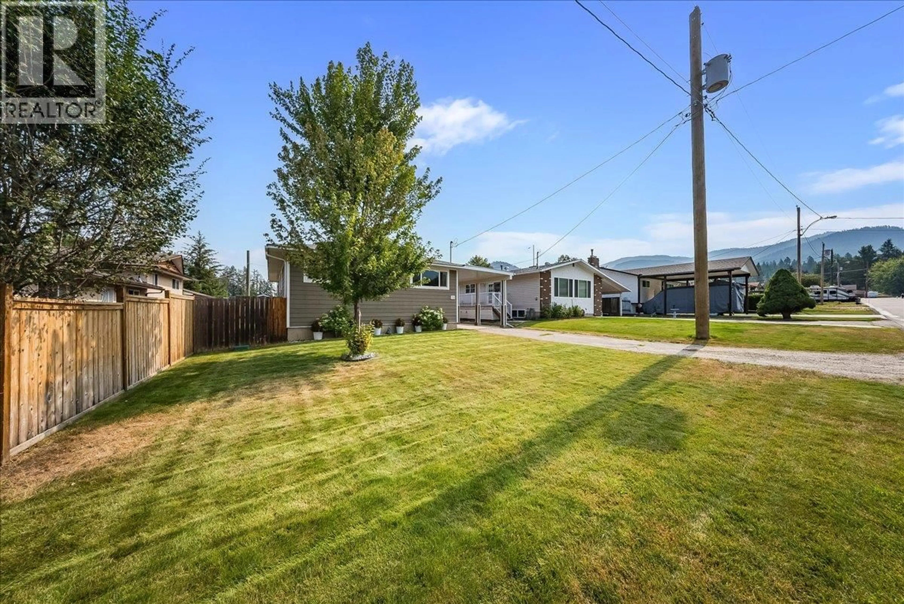 A pic from outside/outdoor area/front of a property/back of a property/a pic from drone, street for 70 WALNUT AVENUE, Fruitvale British Columbia V0G1L0