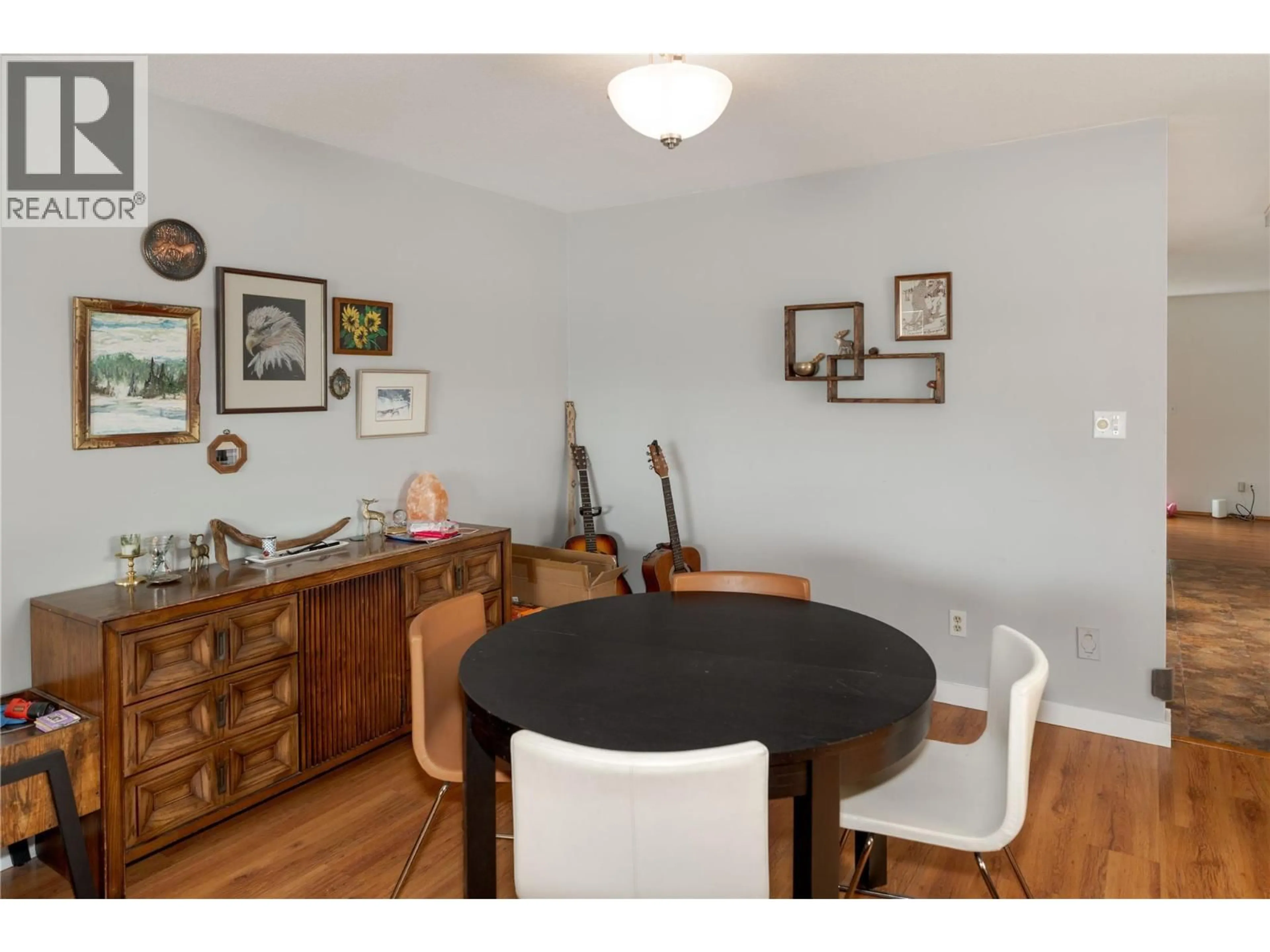 Dining room, wood/laminate floor for 1431 INKAR ROAD, Kelowna British Columbia V1Y8J1