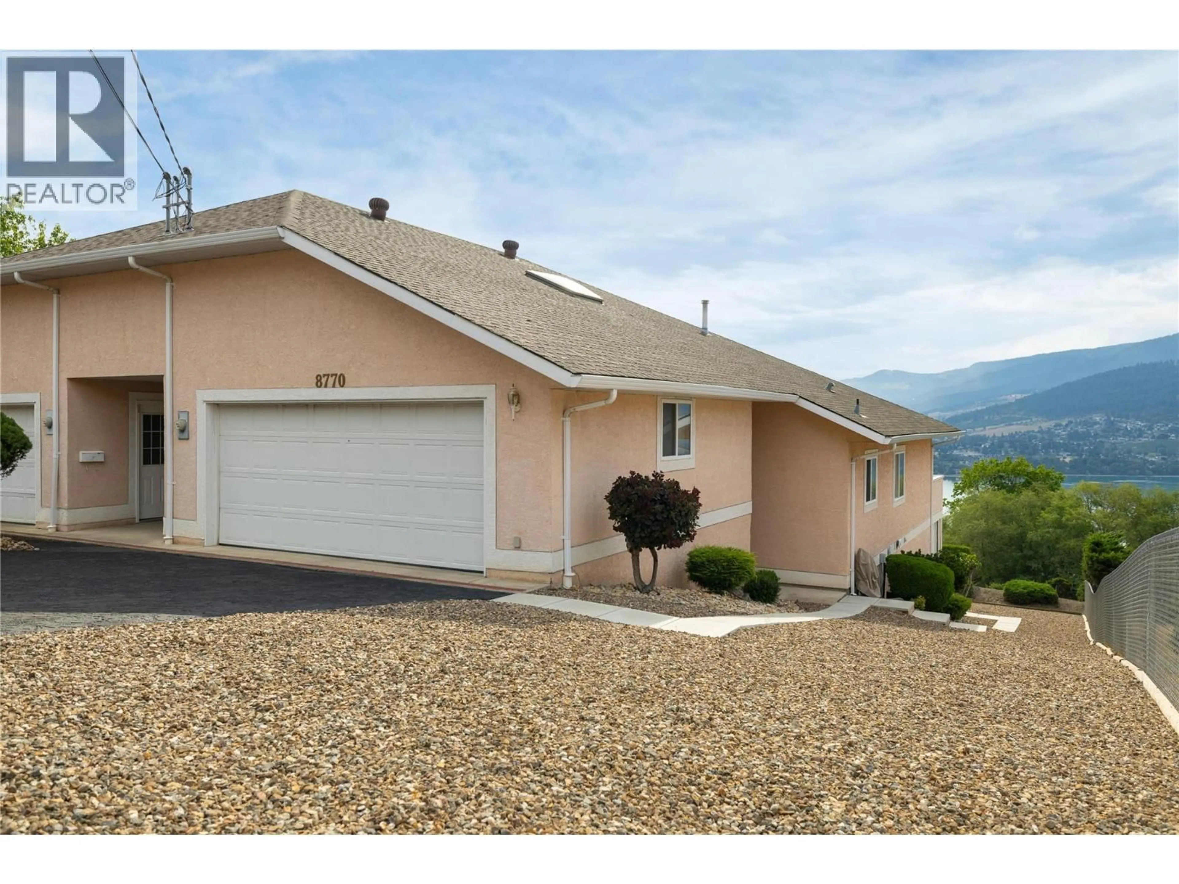 Home with vinyl exterior material, mountain view for 8770 CLERKE ROAD, Coldstream British Columbia V1B1W2