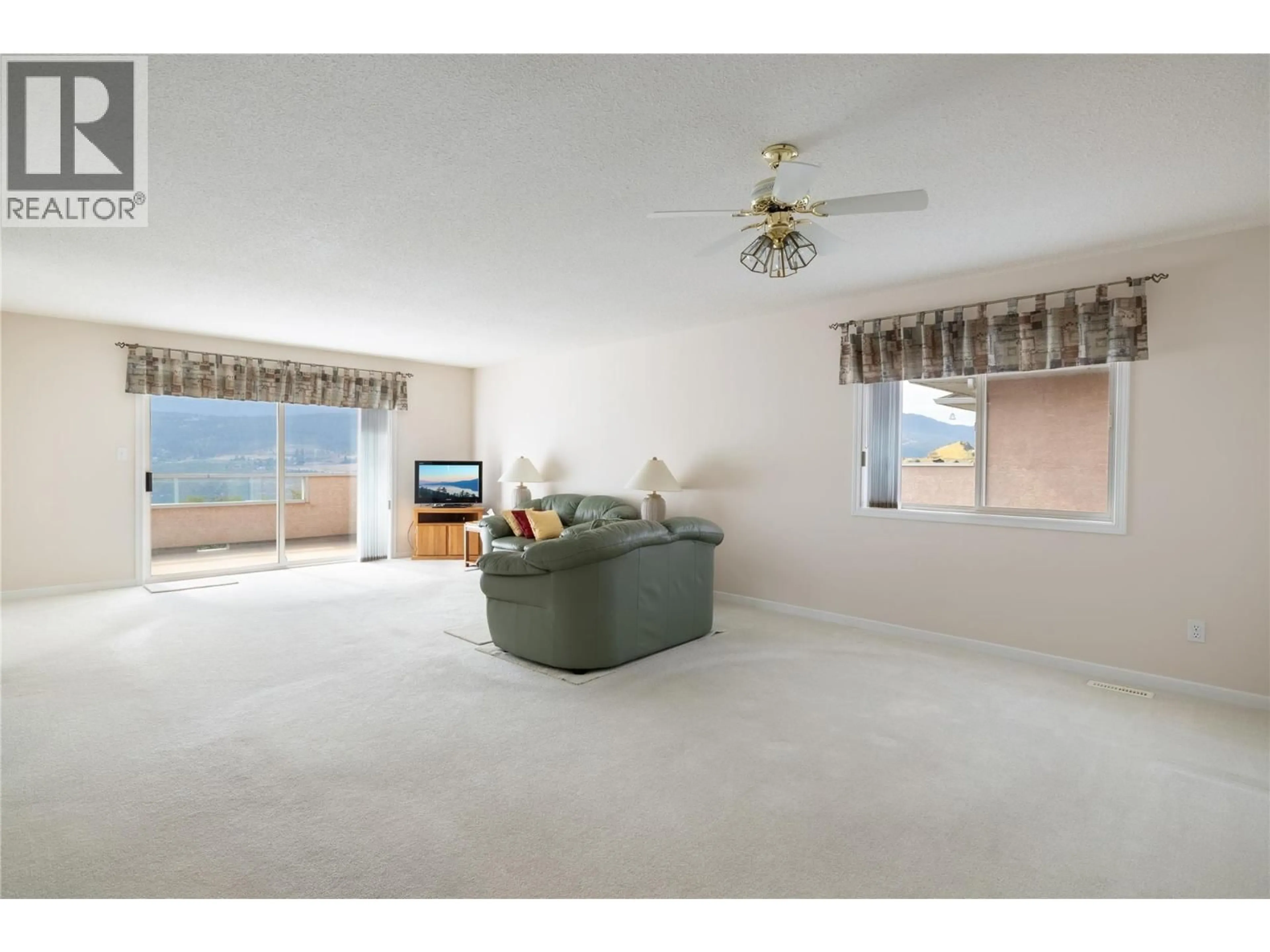 Living room with furniture, unknown for 8770 CLERKE ROAD, Coldstream British Columbia V1B1W2