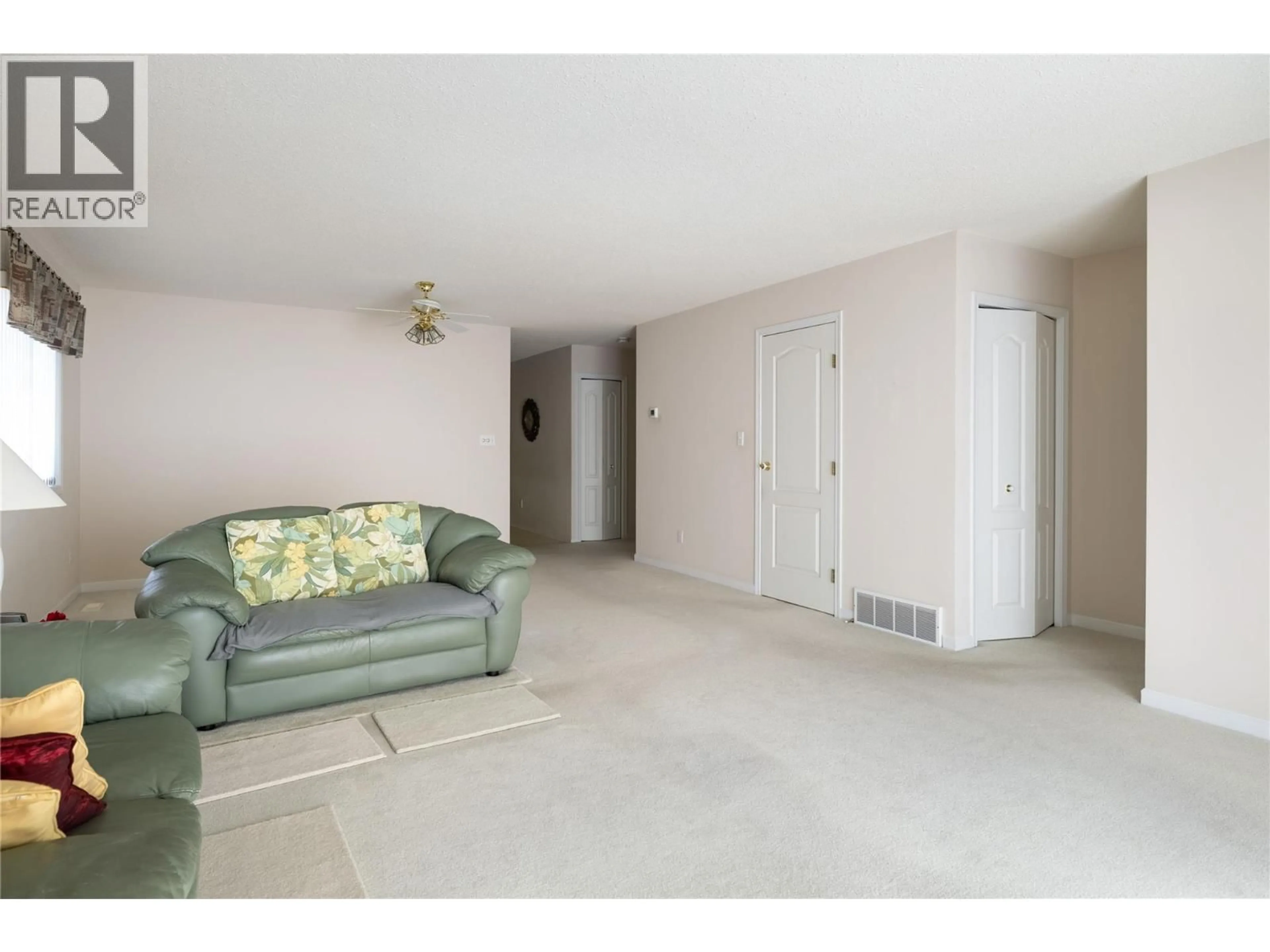 Living room with furniture, unknown for 8770 CLERKE ROAD, Coldstream British Columbia V1B1W2