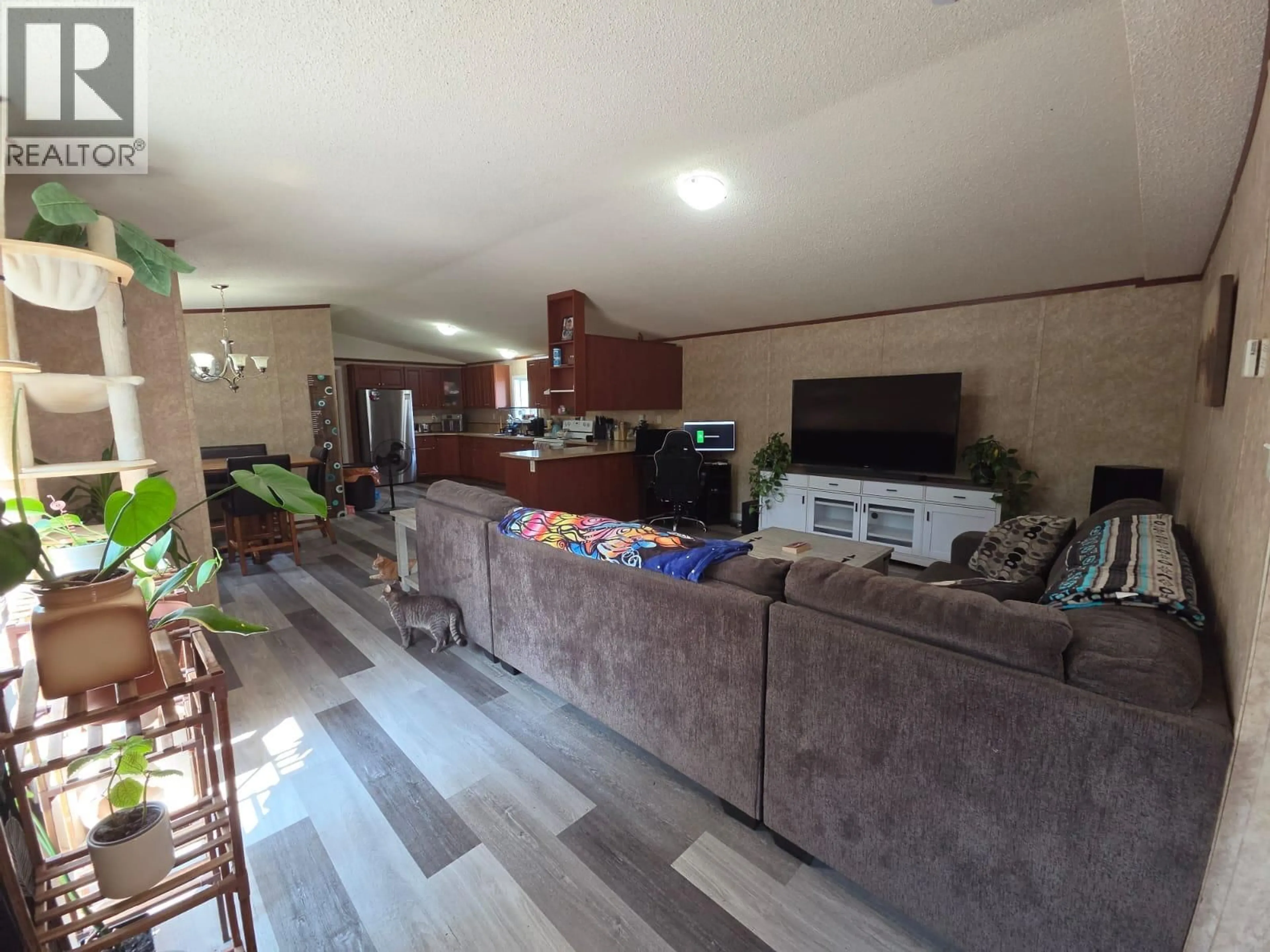 Living room with furniture, unknown for 5277 45 STREET SOUTHEAST, Chetwynd British Columbia V0C1J0