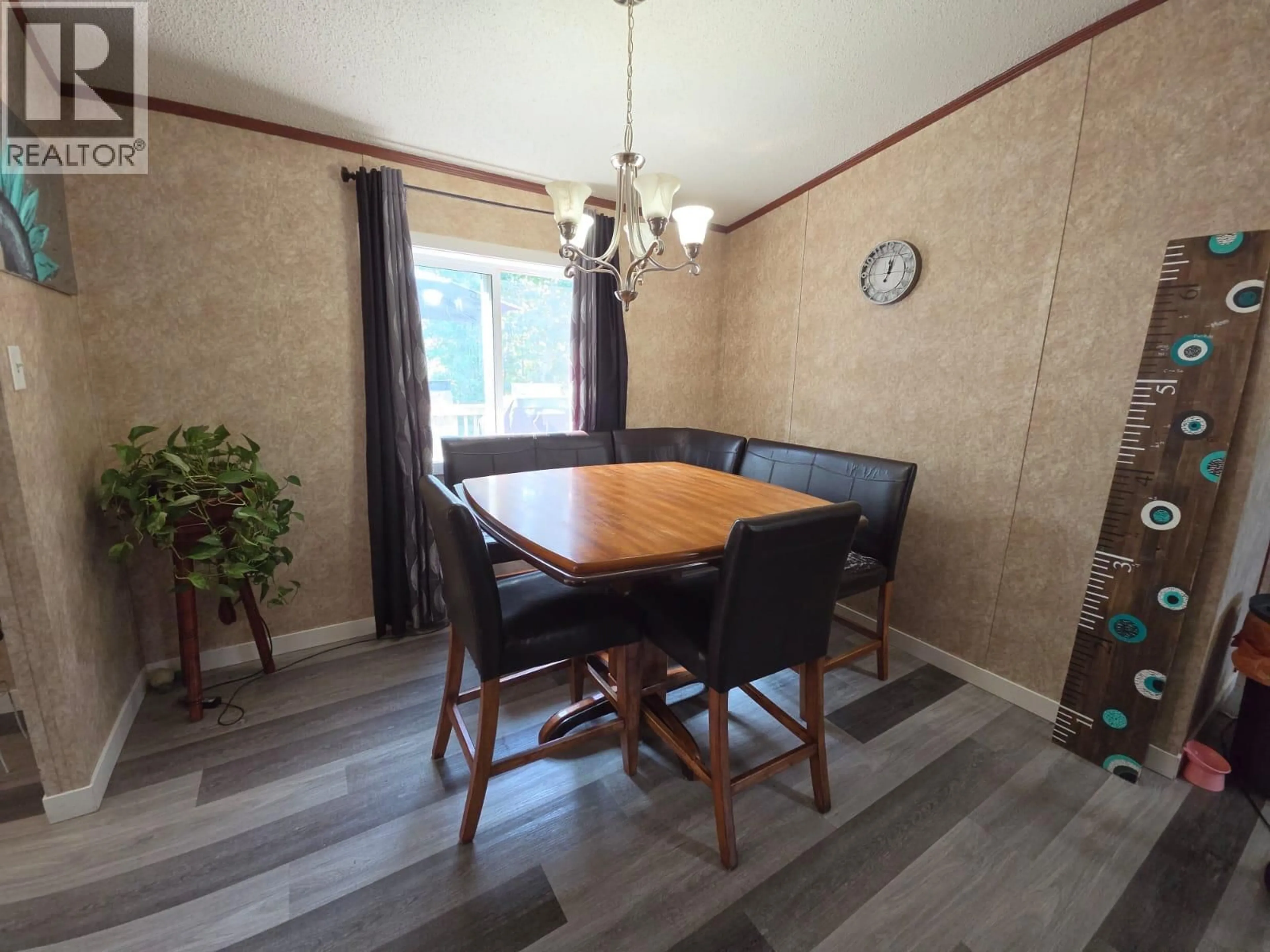 Dining room, wood/laminate floor for 5277 45 STREET SOUTHEAST, Chetwynd British Columbia V0C1J0