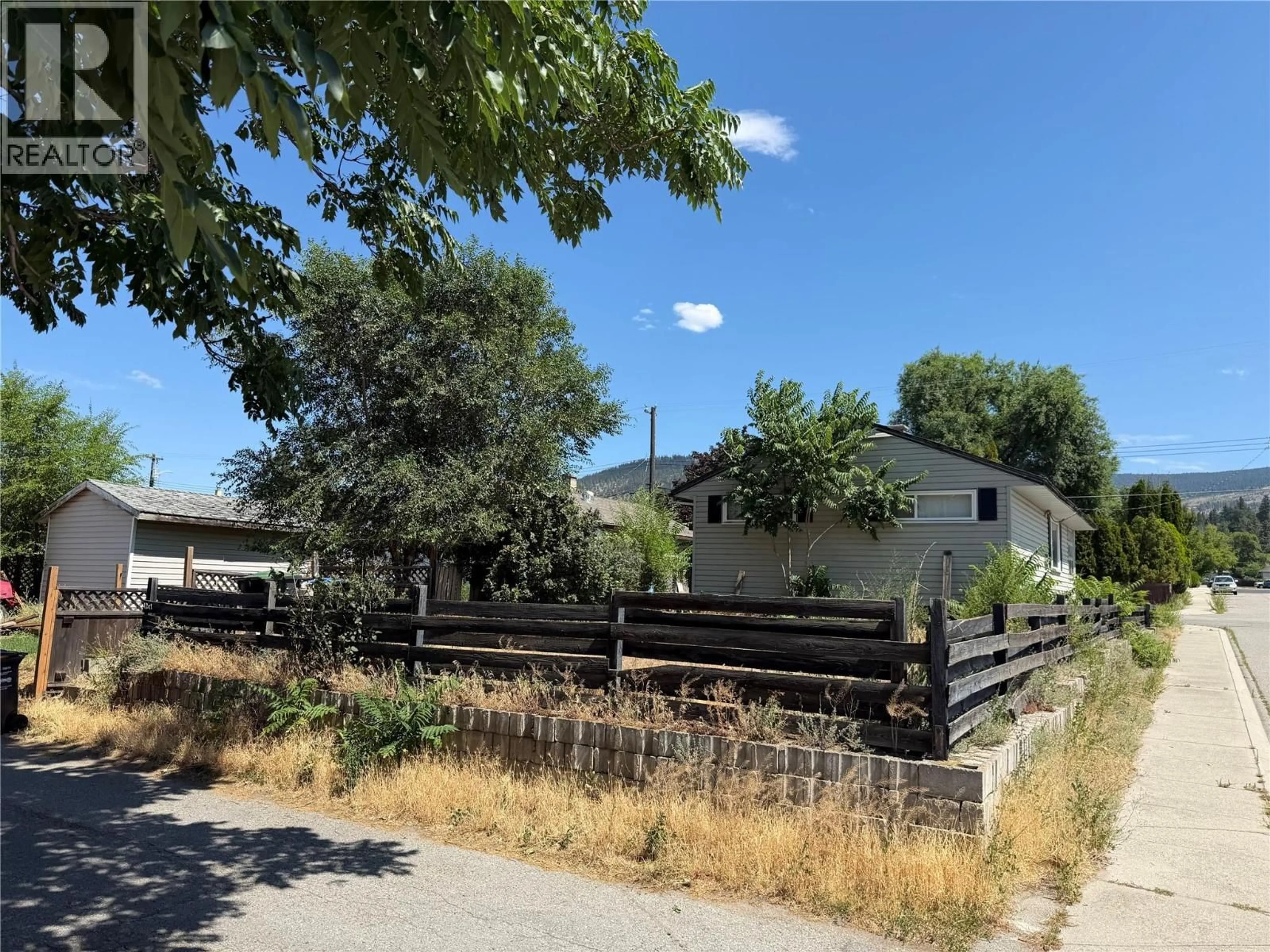 A pic from outside/outdoor area/front of a property/back of a property/a pic from drone, street for 1297 KING STREET, Penticton British Columbia V2A4S9