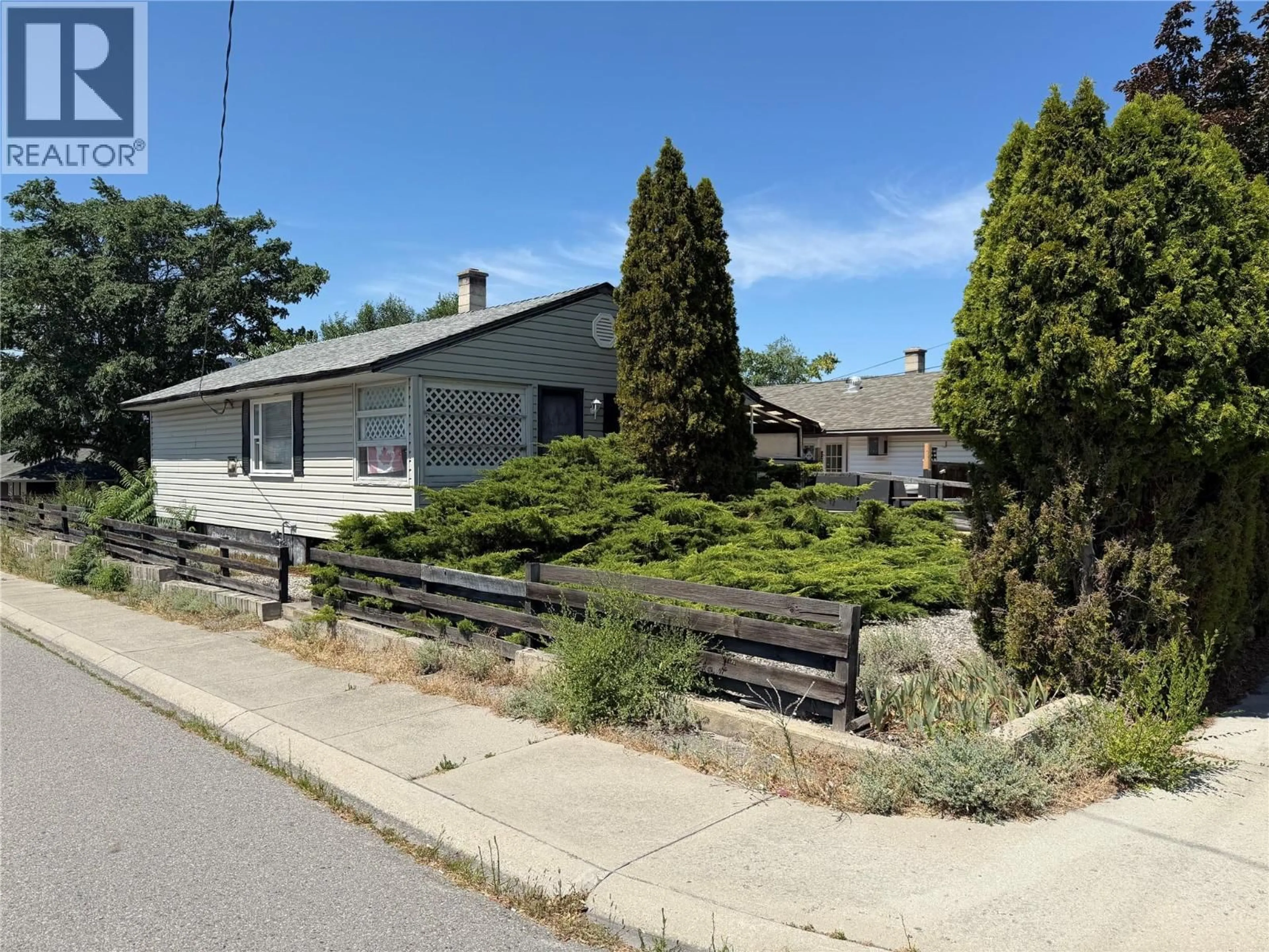 A pic from outside/outdoor area/front of a property/back of a property/a pic from drone, street for 1297 KING STREET, Penticton British Columbia V2A4S9