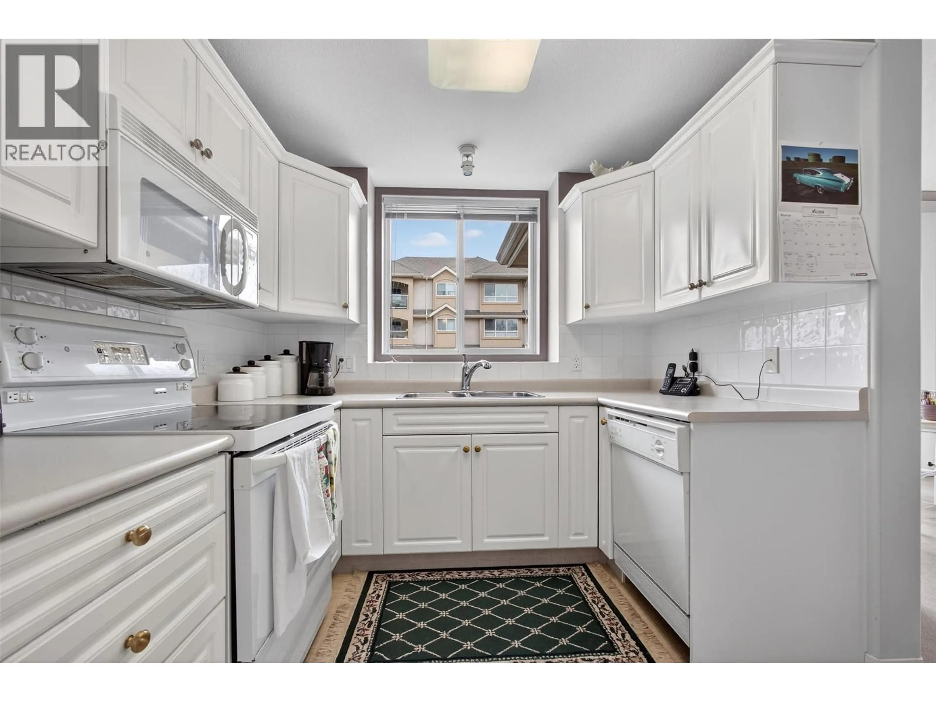Standard kitchen, ceramic/tile floor for 213 - 1966 ENTERPRISE WAY, Kelowna British Columbia V1Y9S8