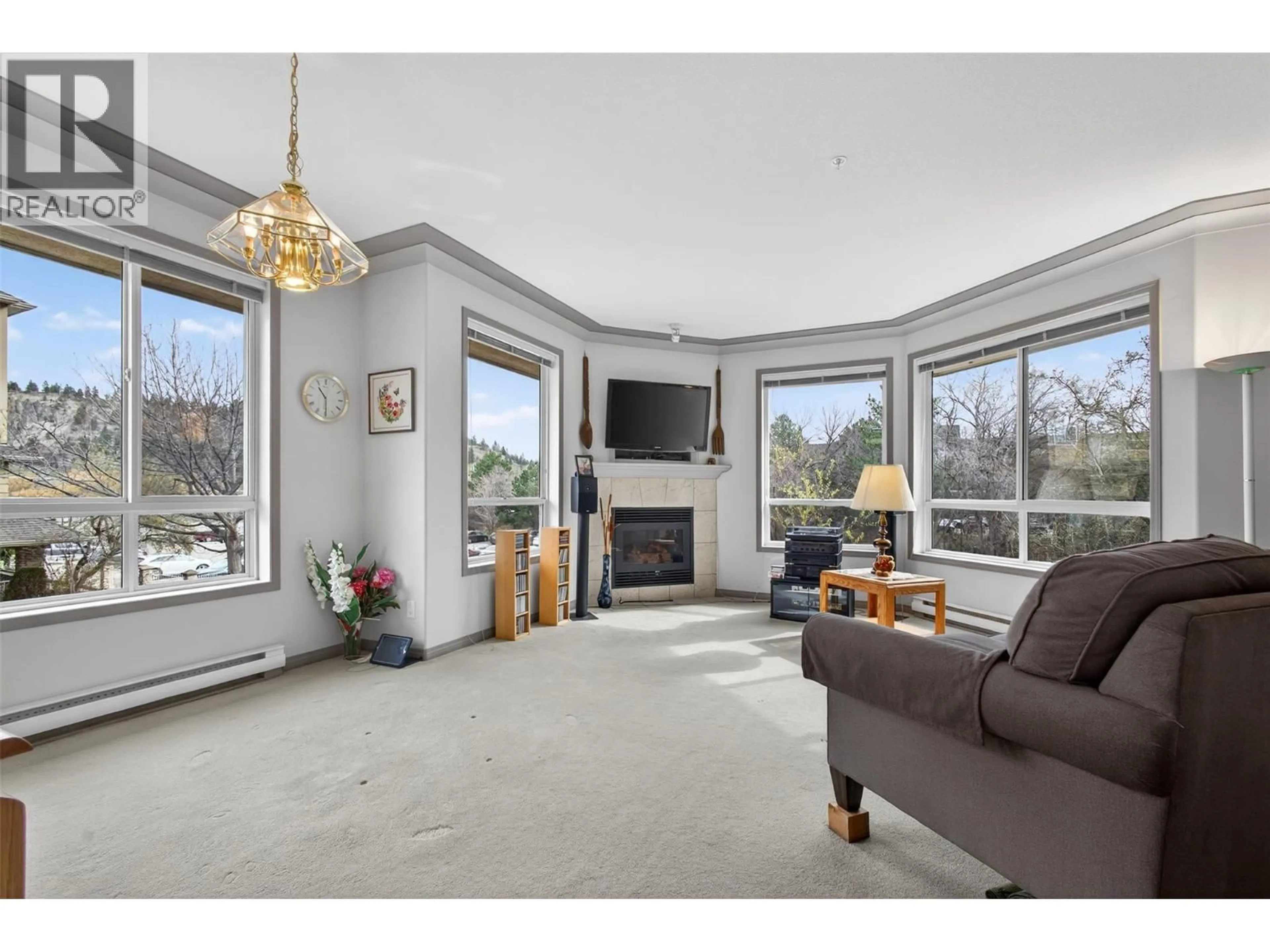 Living room with furniture, unknown for 213 - 1966 ENTERPRISE WAY, Kelowna British Columbia V1Y9S8