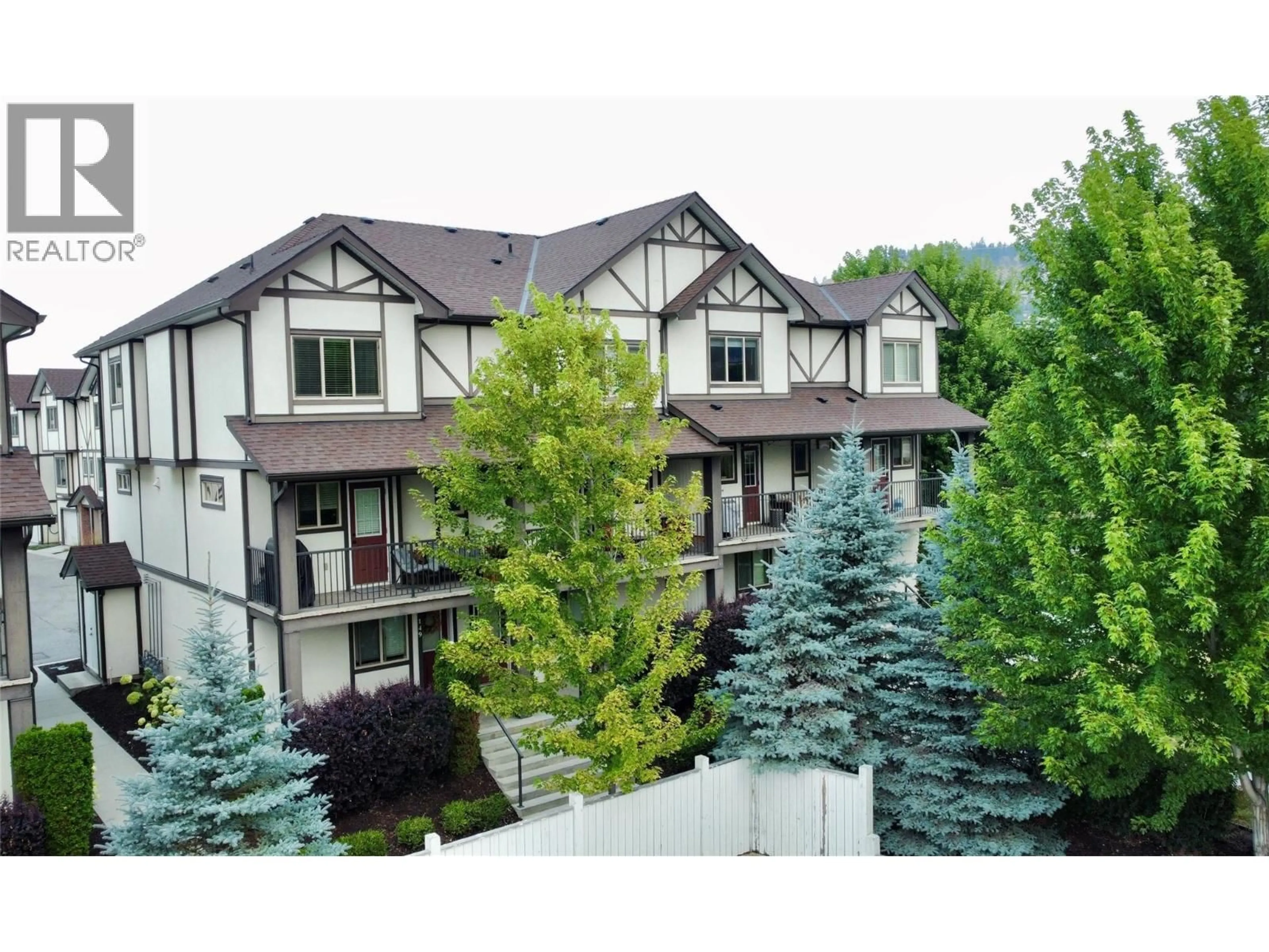 A pic from outside/outdoor area/front of a property/back of a property/a pic from drone, mountain view for 149 - 1651 LYNRICK ROAD, Kelowna British Columbia V1P1R4