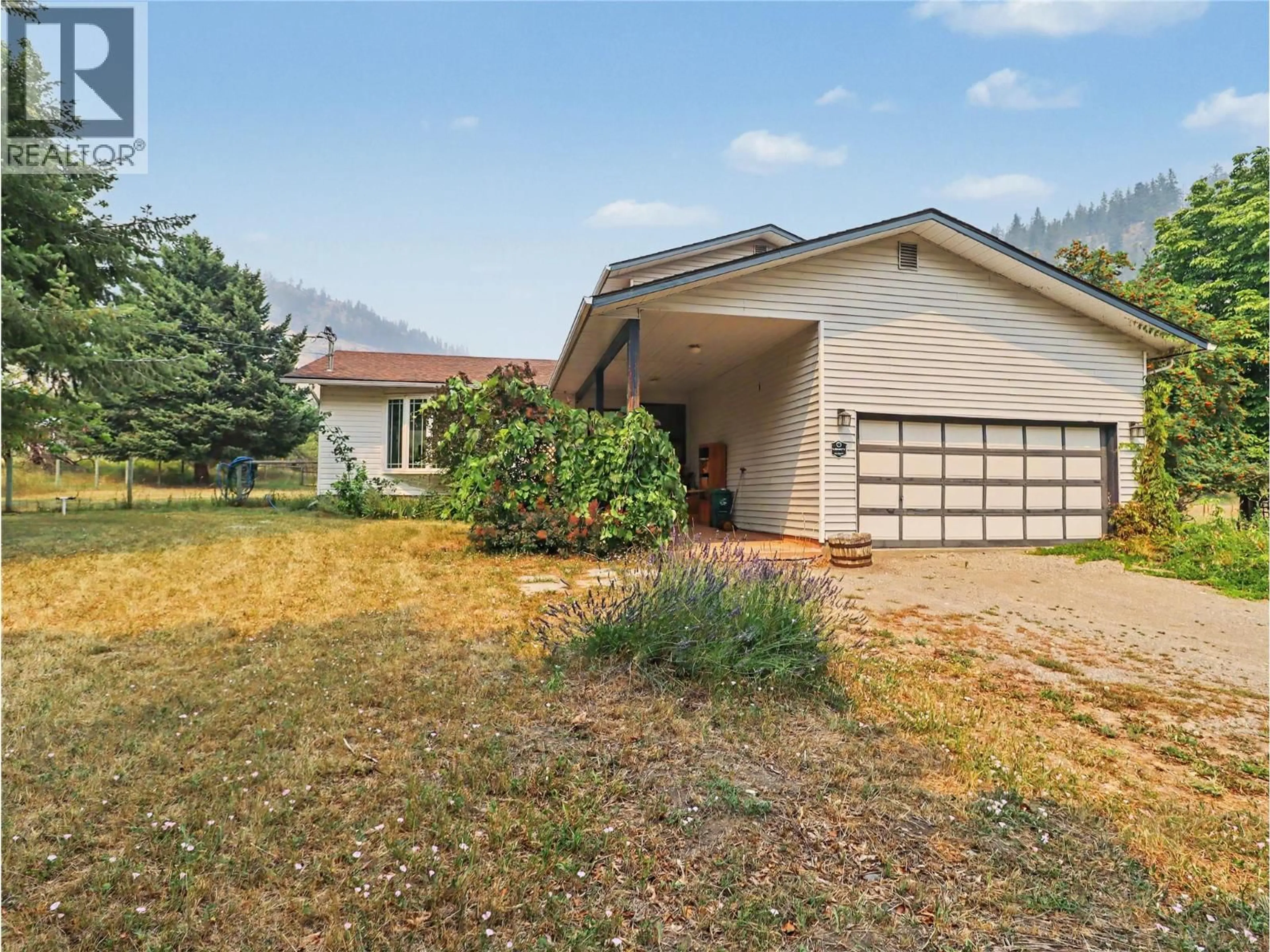 Home with vinyl exterior material, street for 4055 VICTORIA ROAD, Grand Forks British Columbia V0H1H5