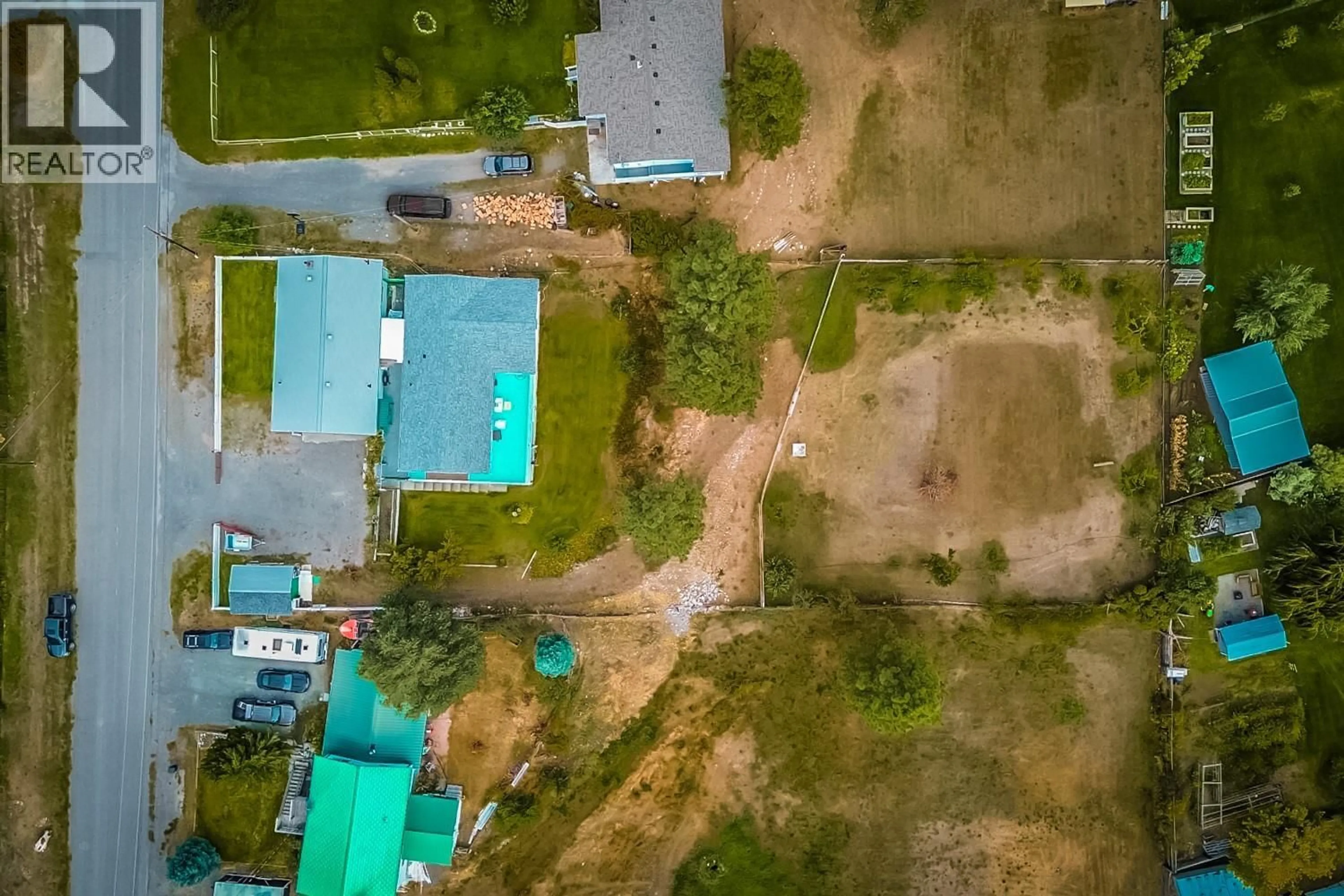 A pic from outside/outdoor area/front of a property/back of a property/a pic from drone, unknown for 475 DAVIDSON CRESCENT, Lillooet British Columbia V0K1V0