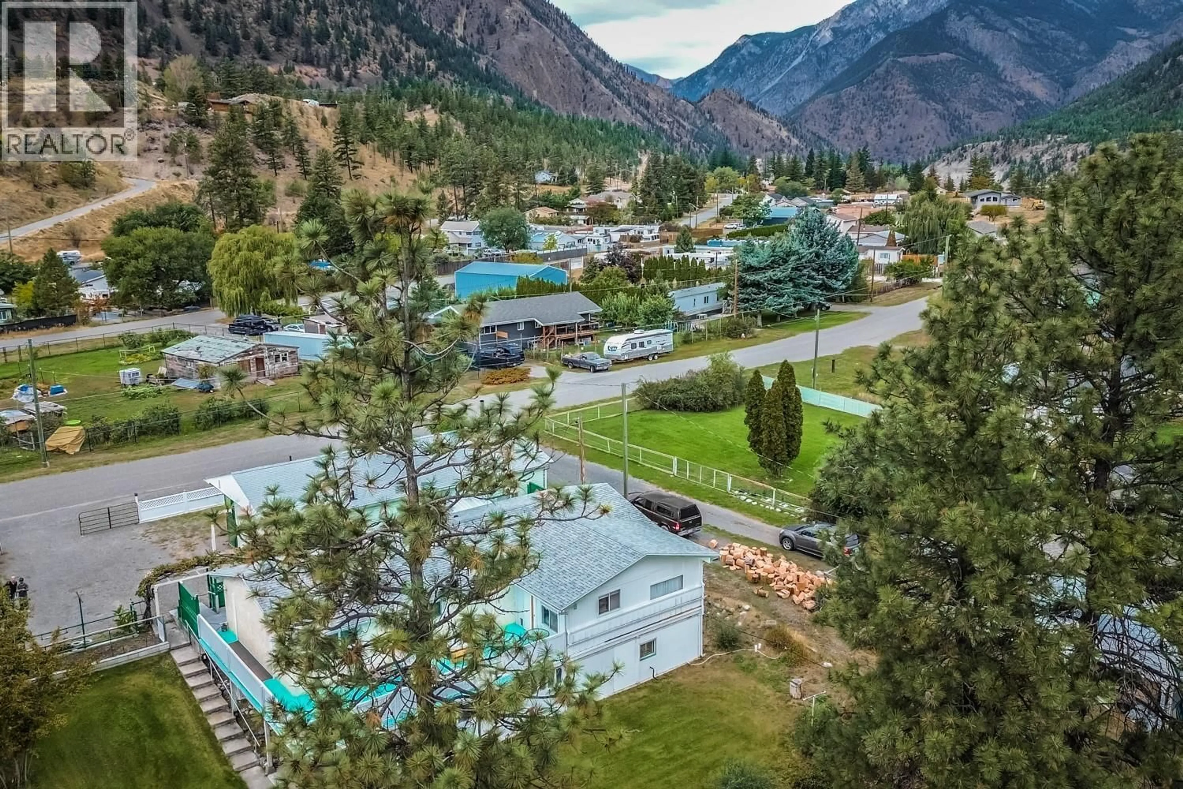 A pic from outside/outdoor area/front of a property/back of a property/a pic from drone, mountain view for 475 DAVIDSON CRESCENT, Lillooet British Columbia V0K1V0