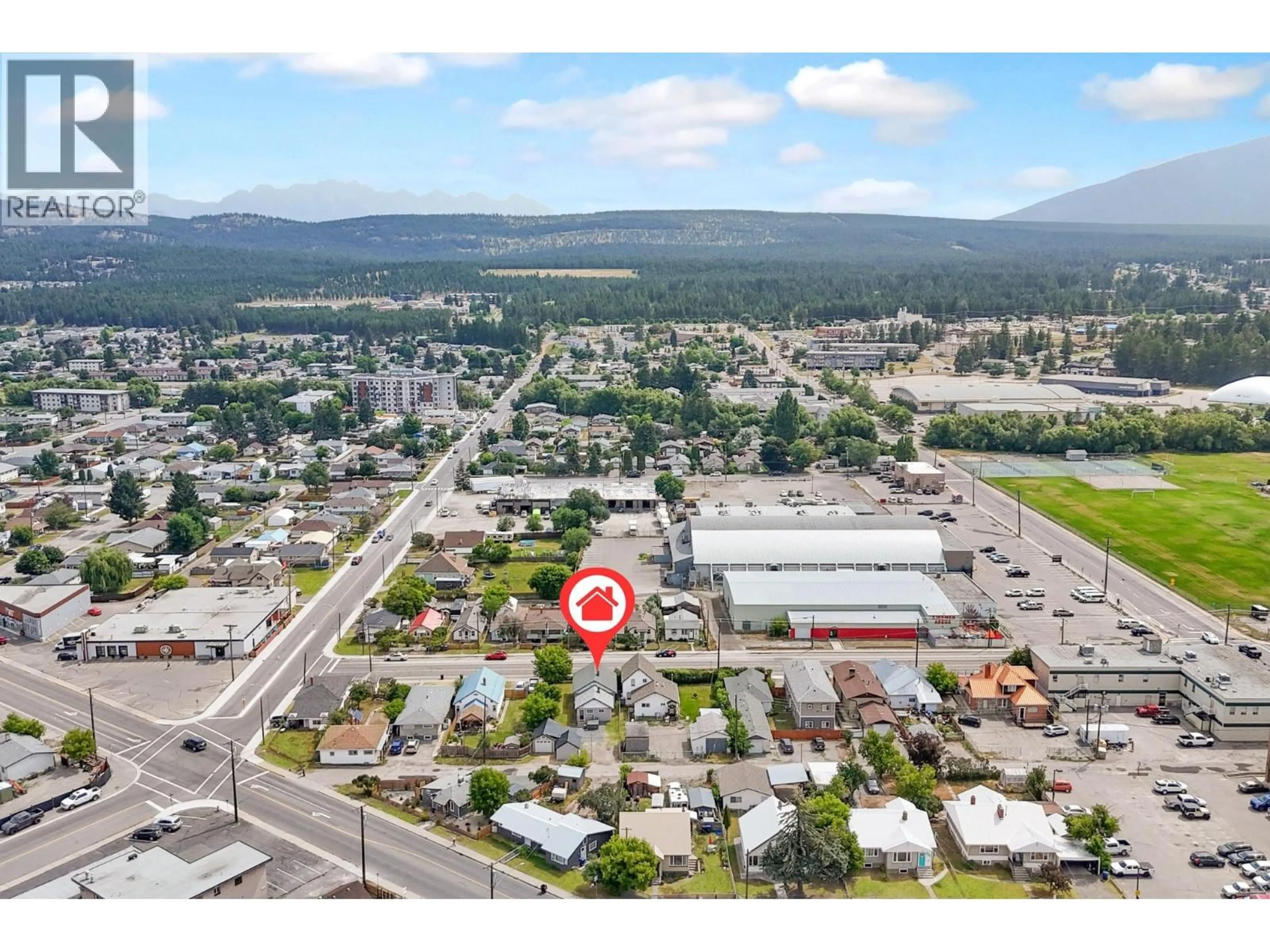 A pic from outside/outdoor area/front of a property/back of a property/a pic from drone, mountain view for 225 14 AVENUE NORTH, Cranbrook British Columbia V1C3W3