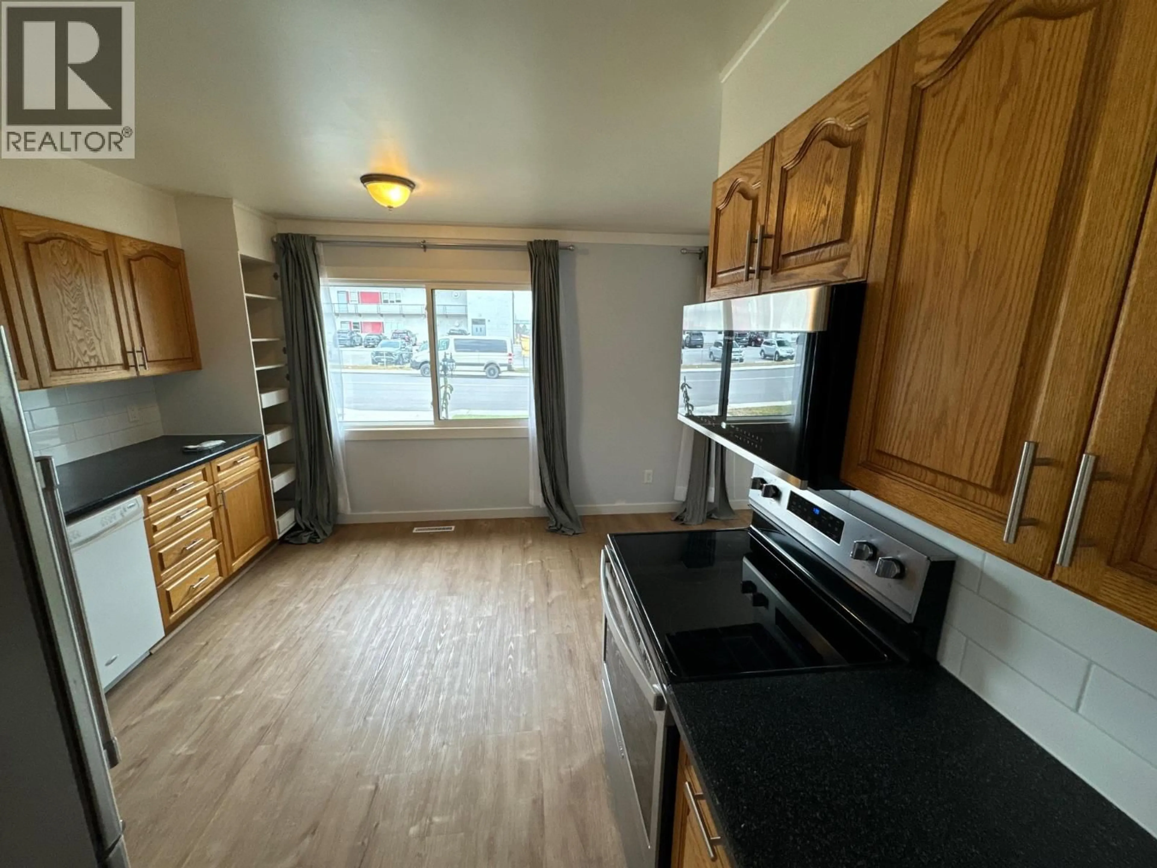 Standard kitchen, wood/laminate floor for 1909 2ND STREET SOUTH, Cranbrook British Columbia V1C1C6