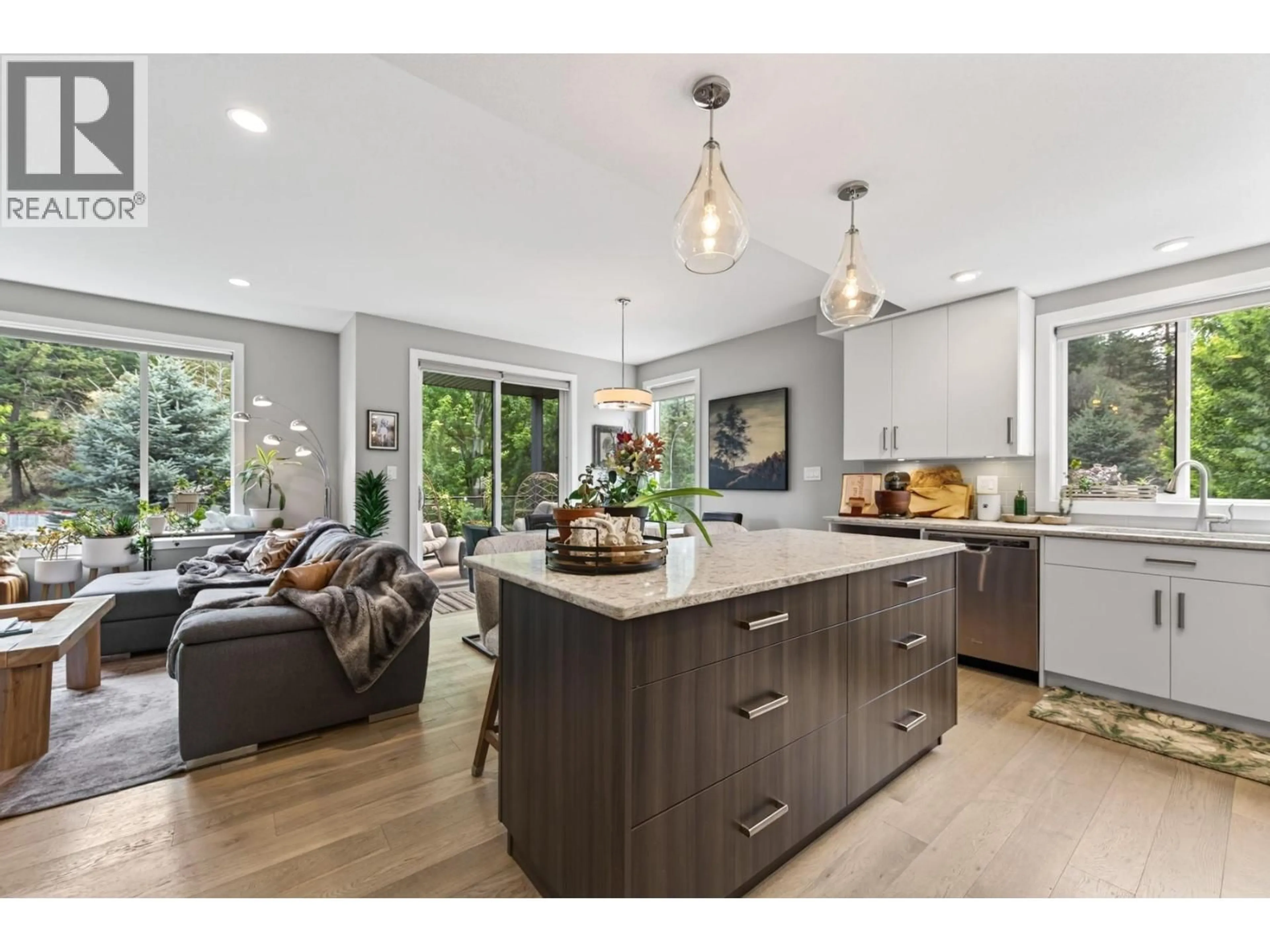 Open concept kitchen, wood/laminate floor for 101 - 580 SEDONA DRIVE, Kamloops British Columbia V2E1H6