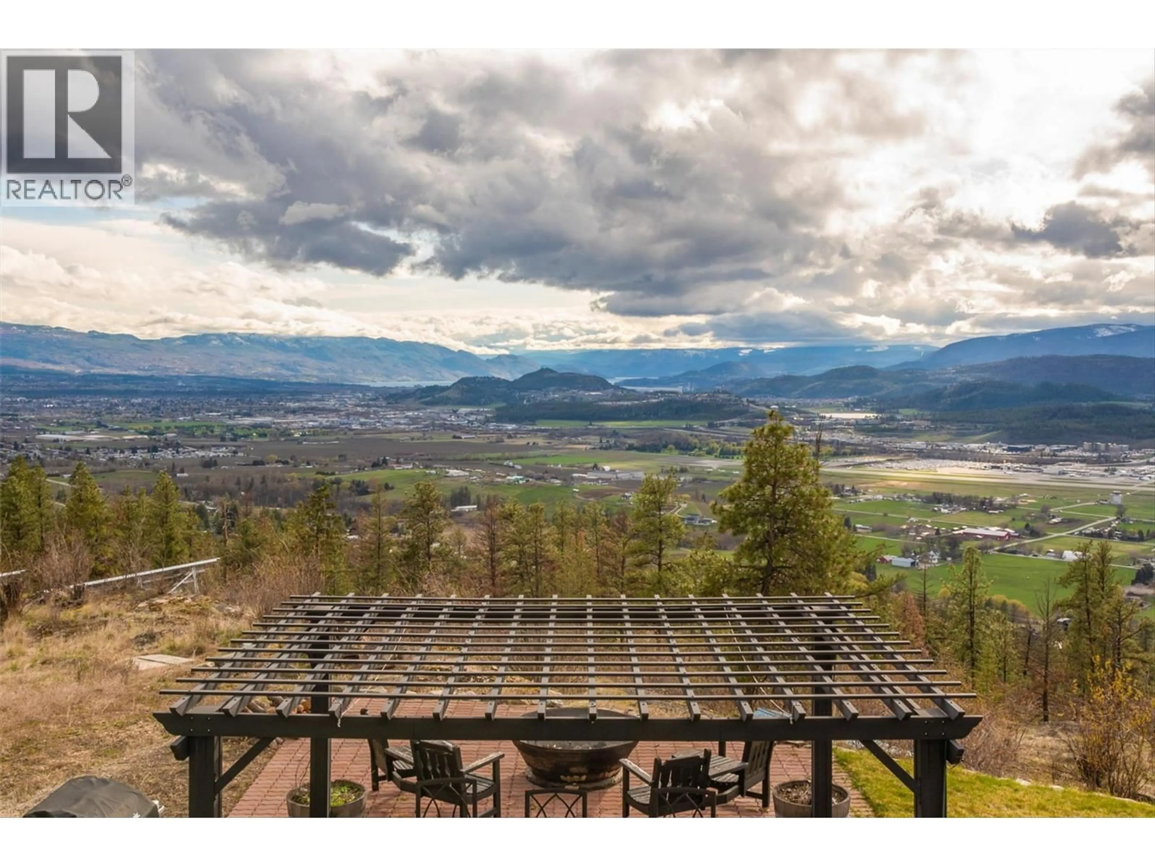 A pic from outside/outdoor area/front of a property/back of a property/a pic from drone, mountain view for 5474 DEADPINE DRIVE, Kelowna British Columbia V1P1A3