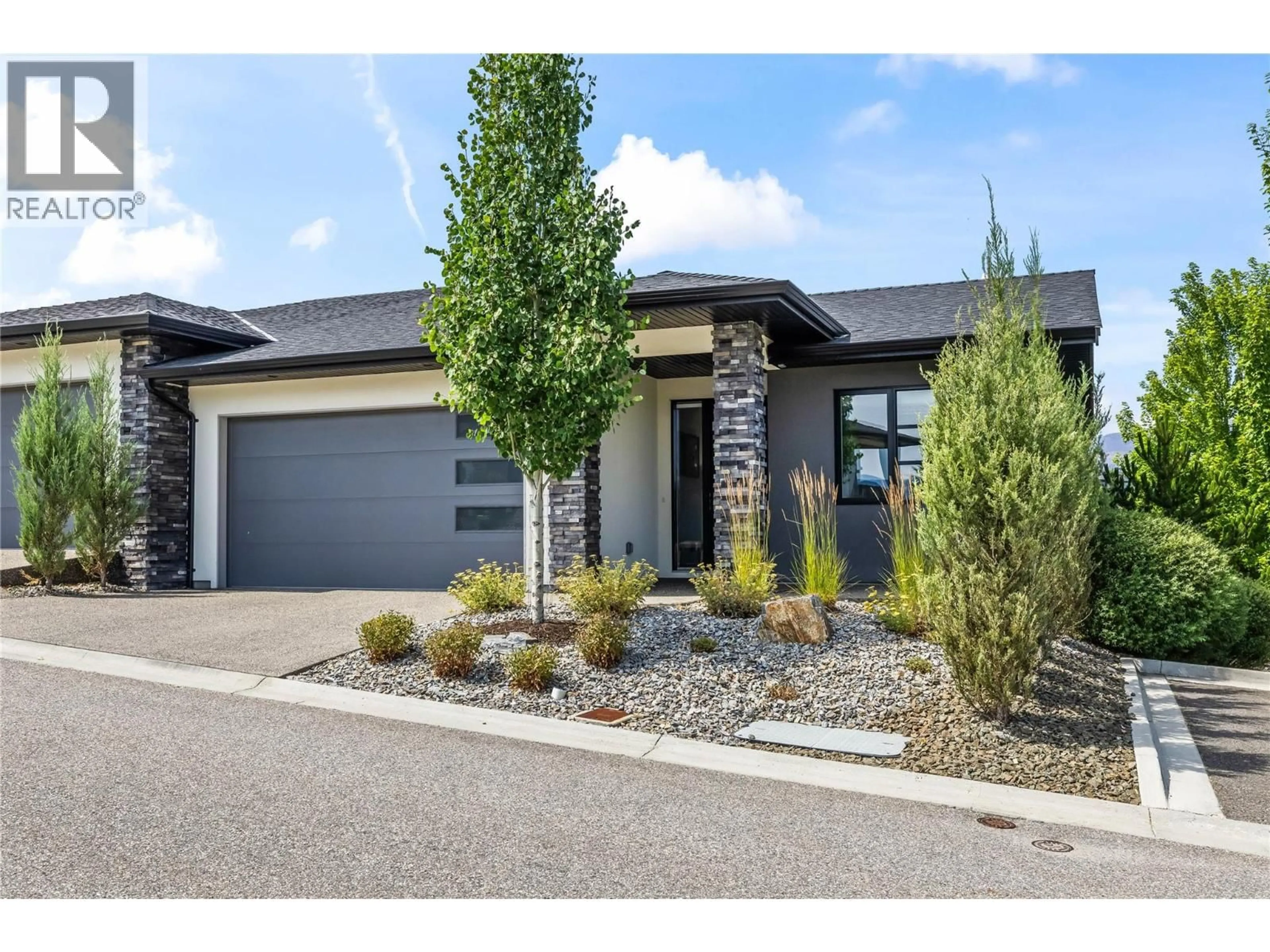 Home with brick exterior material, street for 6 - 1349 ROCKY POINT DRIVE, Kelowna British Columbia V1V0B5