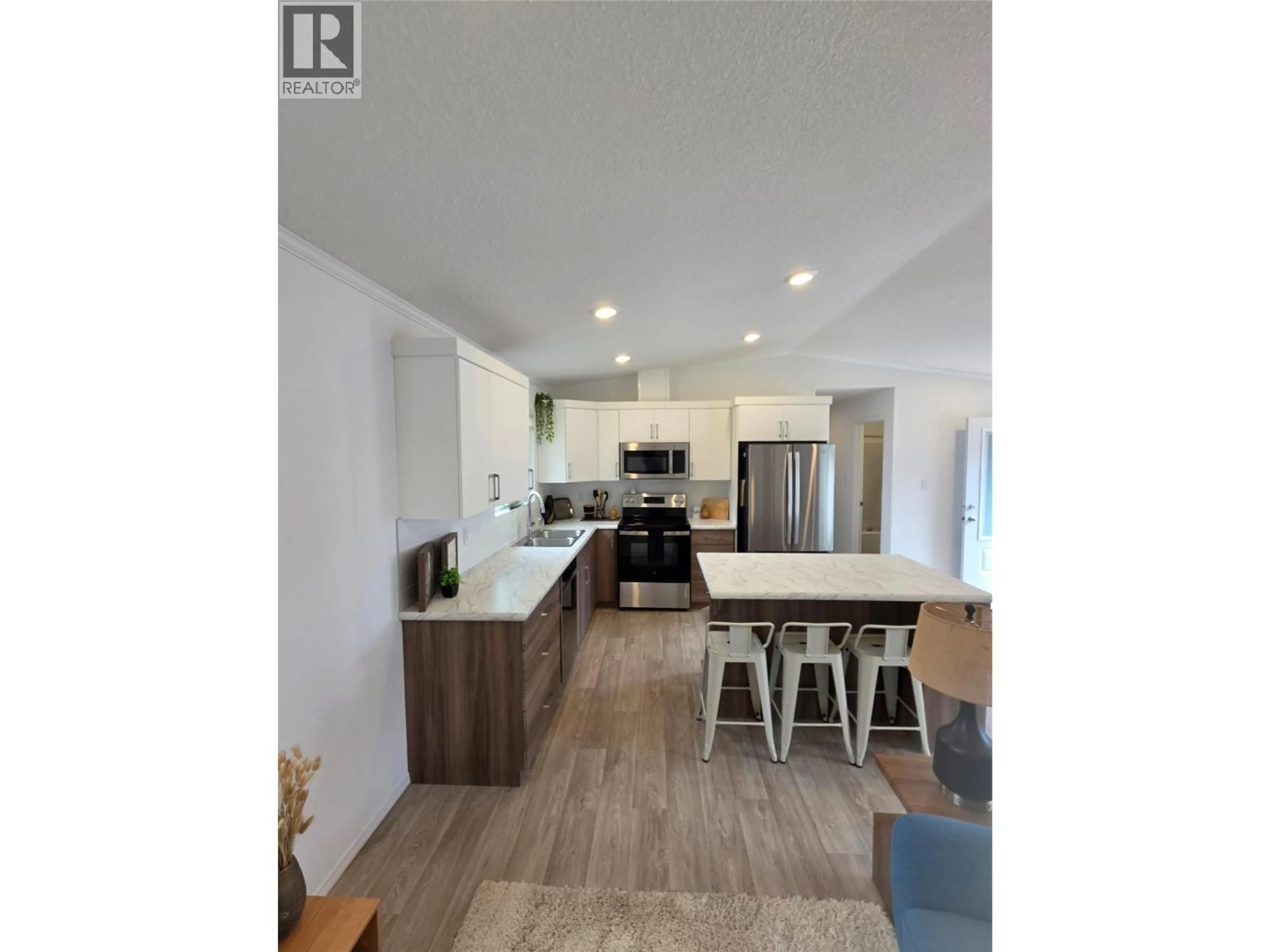 Open concept kitchen, wood/laminate floor for 30 - 235 AYLMER ROAD, Chase British Columbia V0E1M1