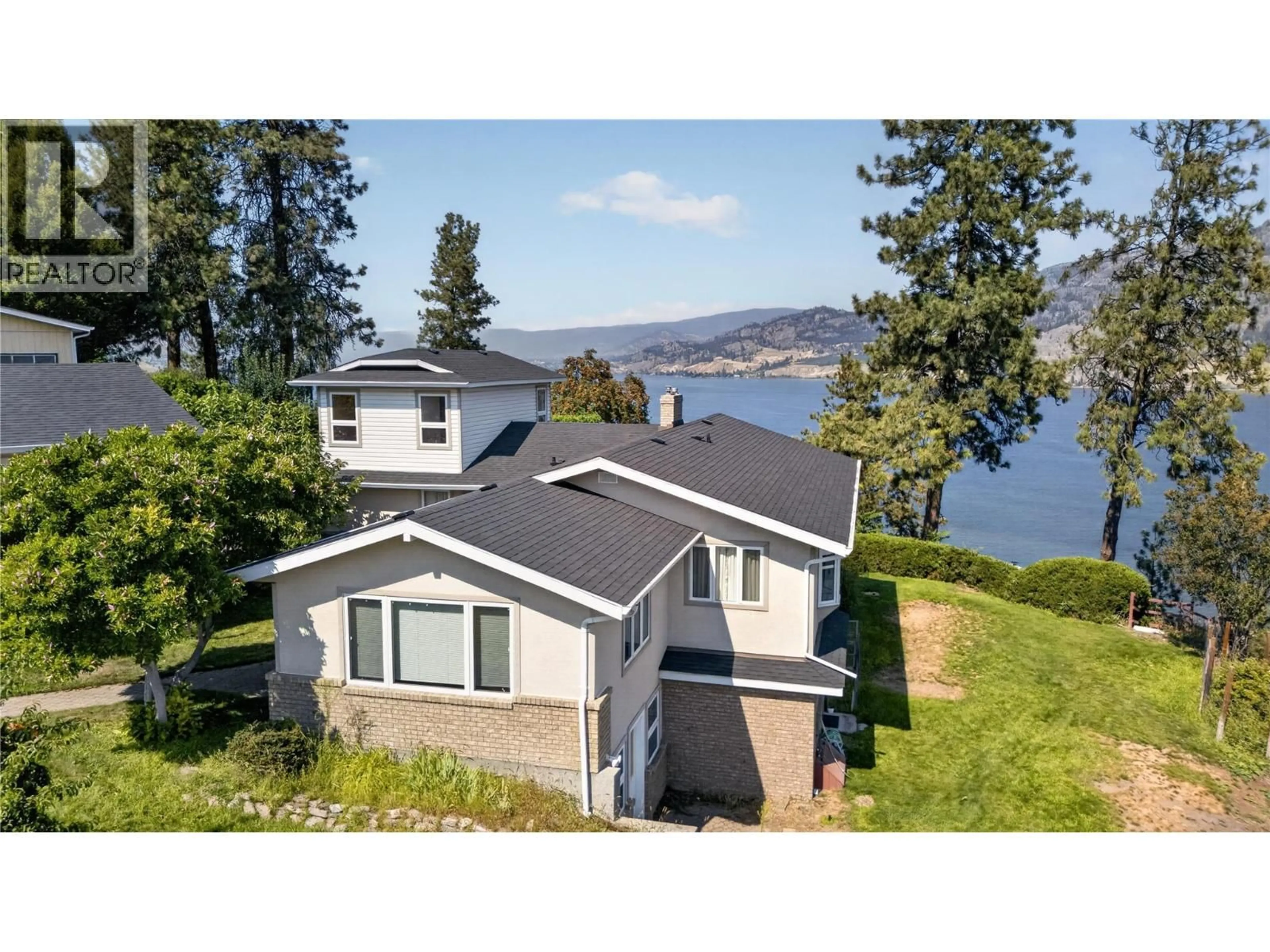 A pic from outside/outdoor area/front of a property/back of a property/a pic from drone, water/lake/river/ocean view for 131 CEDAR AVENUE, Kaleden British Columbia V0H1K0