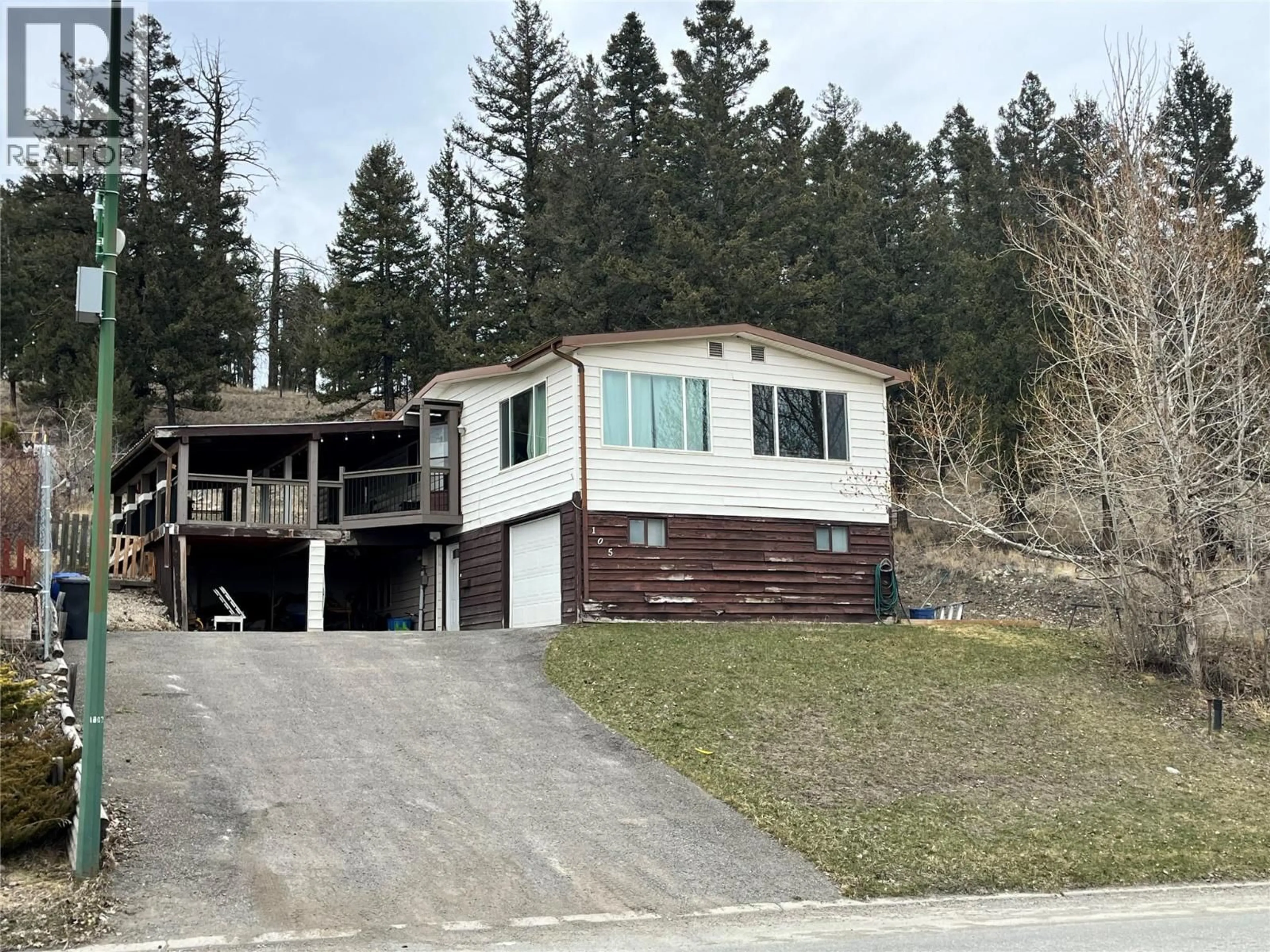 Home with vinyl exterior material, street for 105 JASPER DRIVE, Logan Lake British Columbia V0K1W0