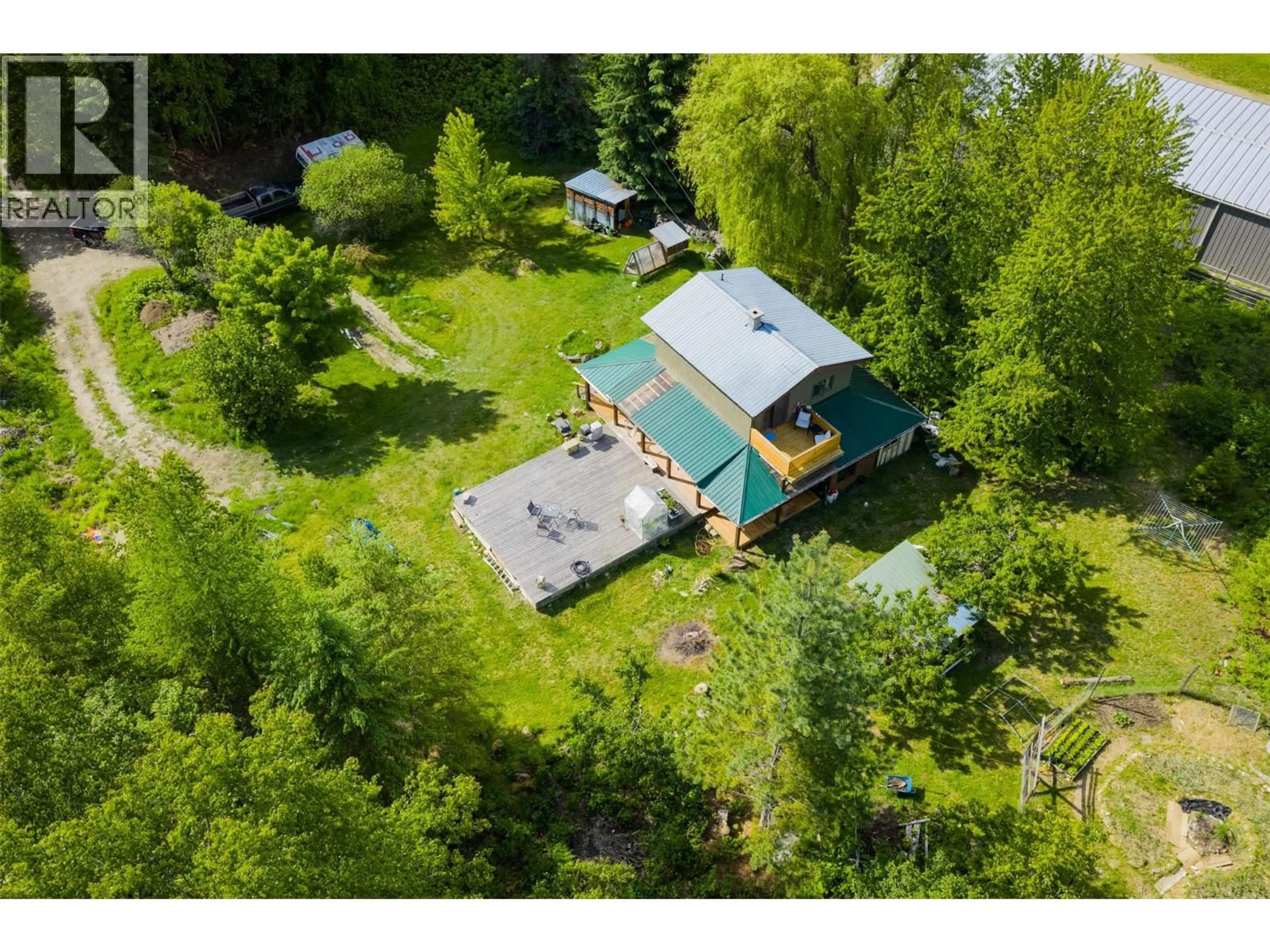 A pic from outside/outdoor area/front of a property/back of a property/a pic from drone, unknown for 7010 PERRYS CEMETERY ROAD, Winlaw British Columbia V0G2J0